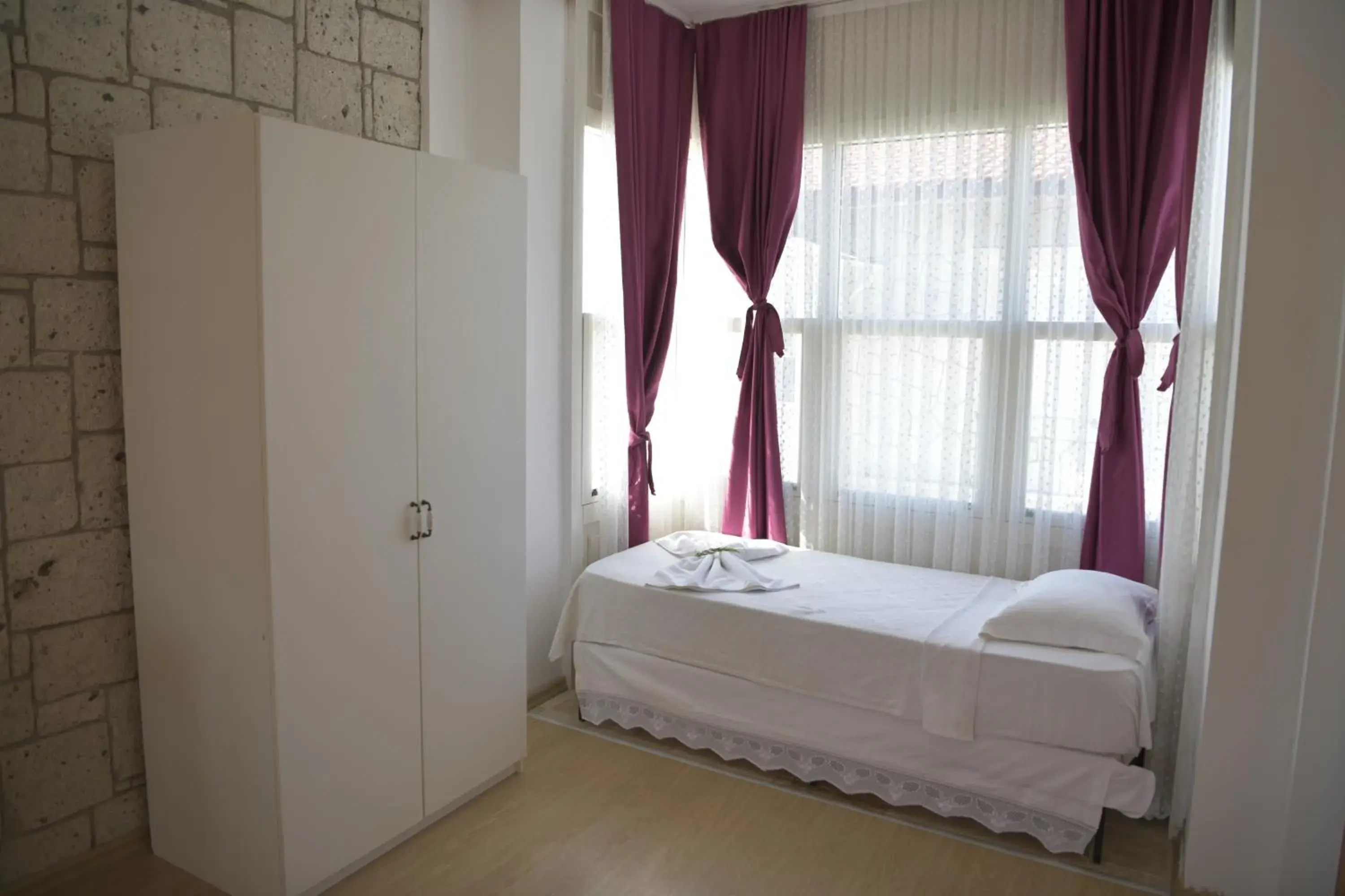 Bed in Kemerlihan Deluxe Hotel Bed in Kemerlihan Deluxe Hotel