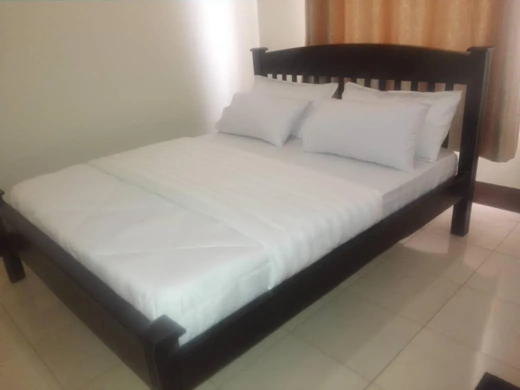 Bed in Coffee Tourist Motel