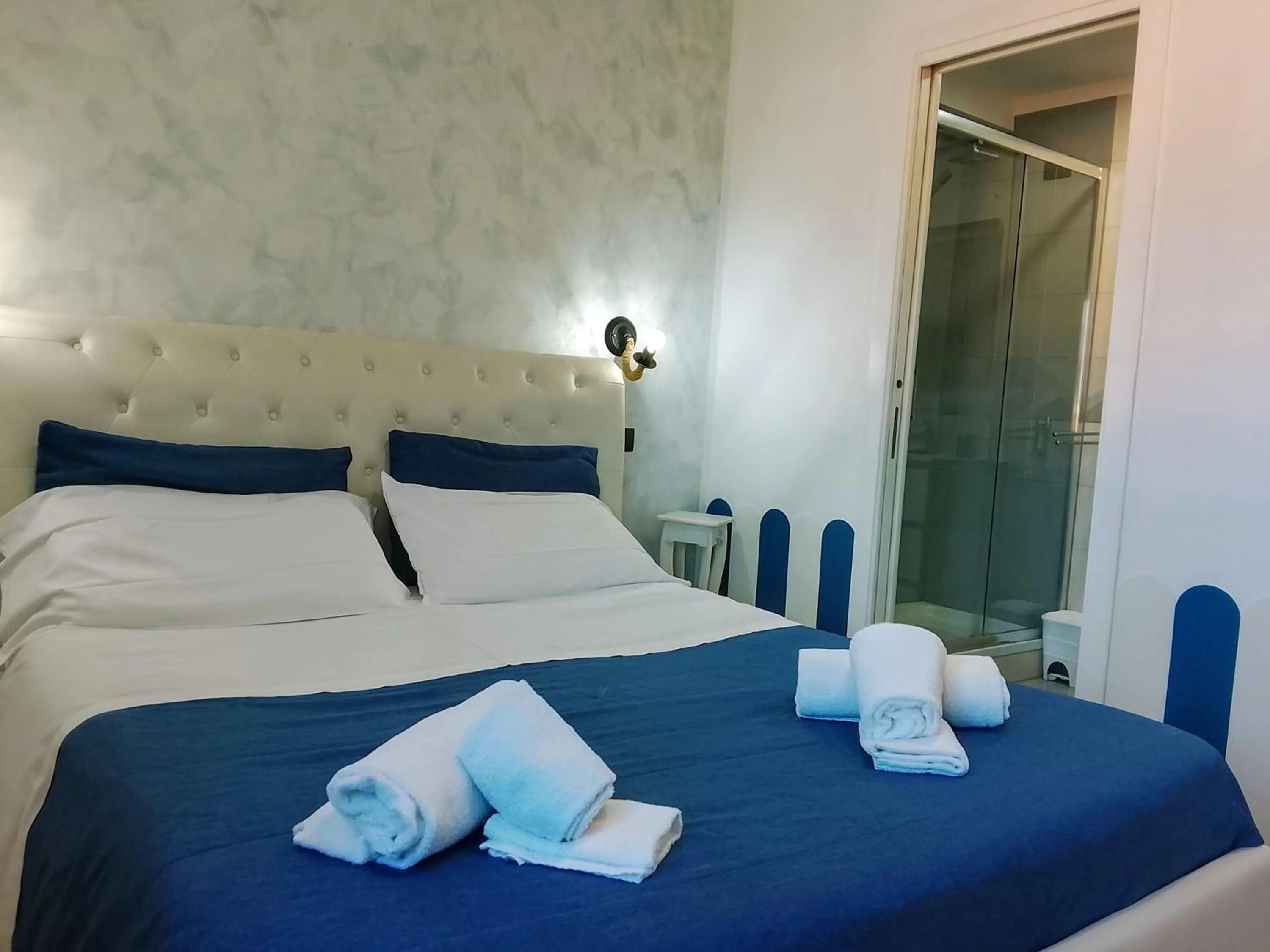 Bed in Domus Michaeli B&B Pompei perfetto per famiglie e gruppi Camere confortevoli vicino agli Scavi e al centro