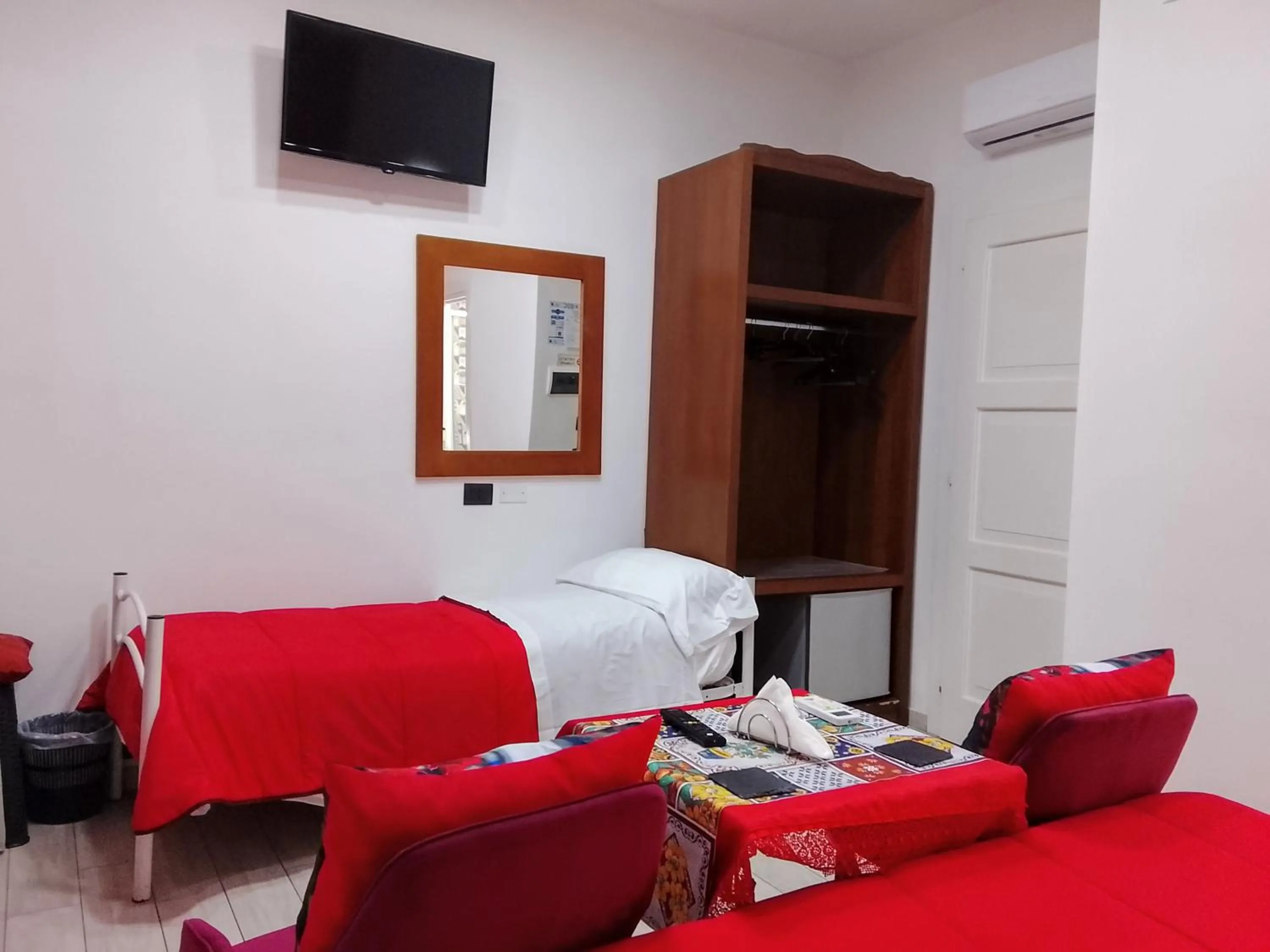 Bed in Domus Michaeli B&B Pompei perfetto per famiglie e gruppi Camere confortevoli vicino agli Scavi e al centro