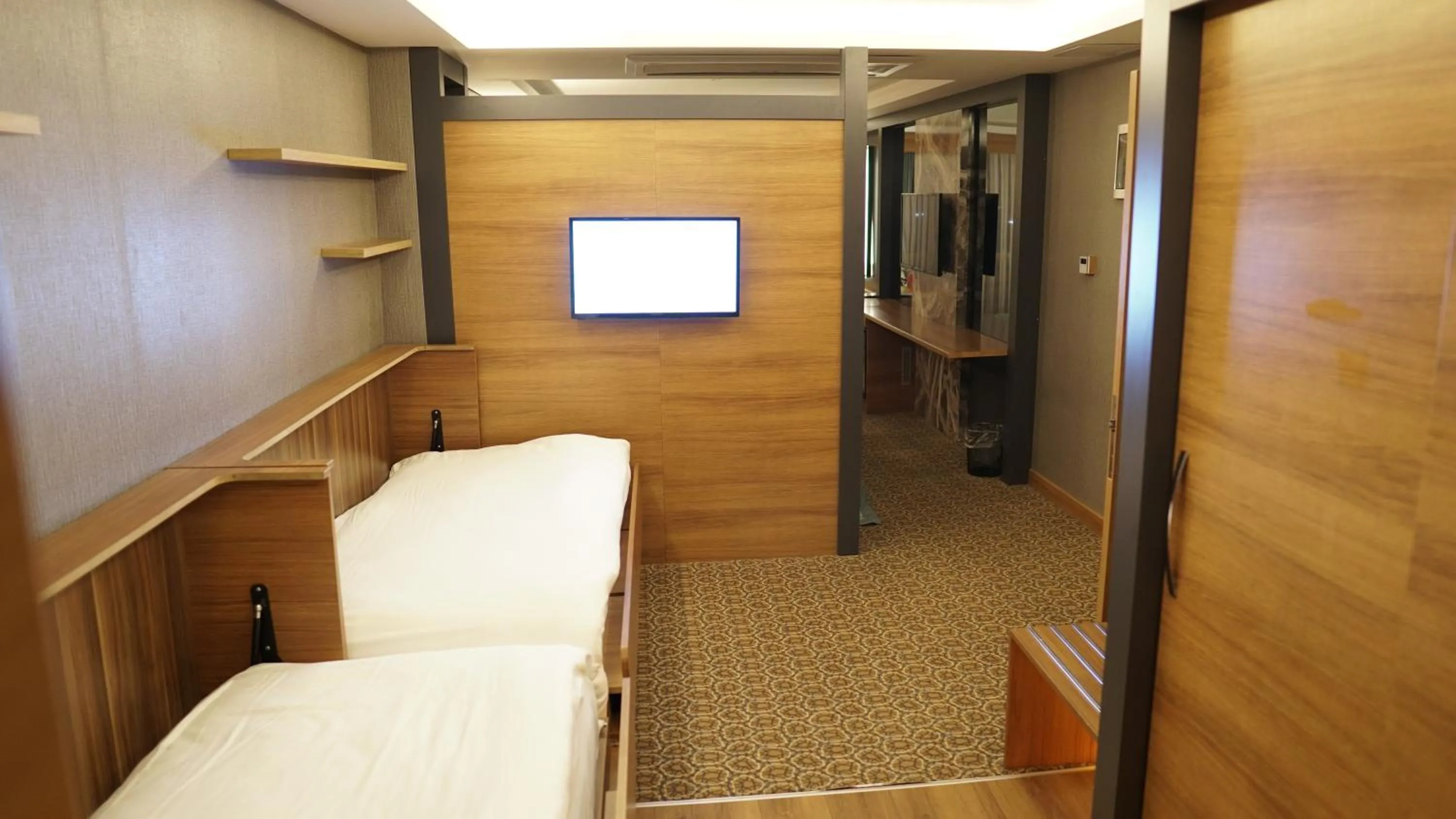 Bed in Green Prusa Hotel