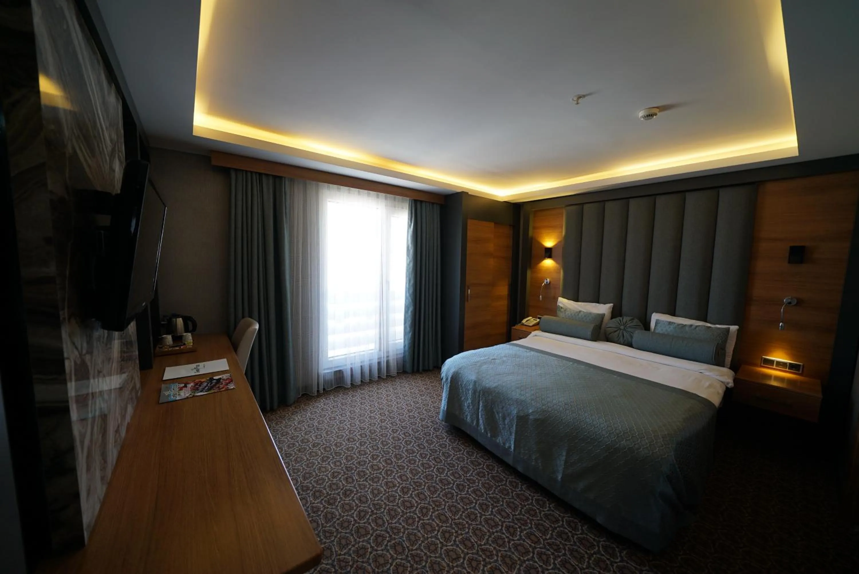 Bed in Green Prusa Hotel