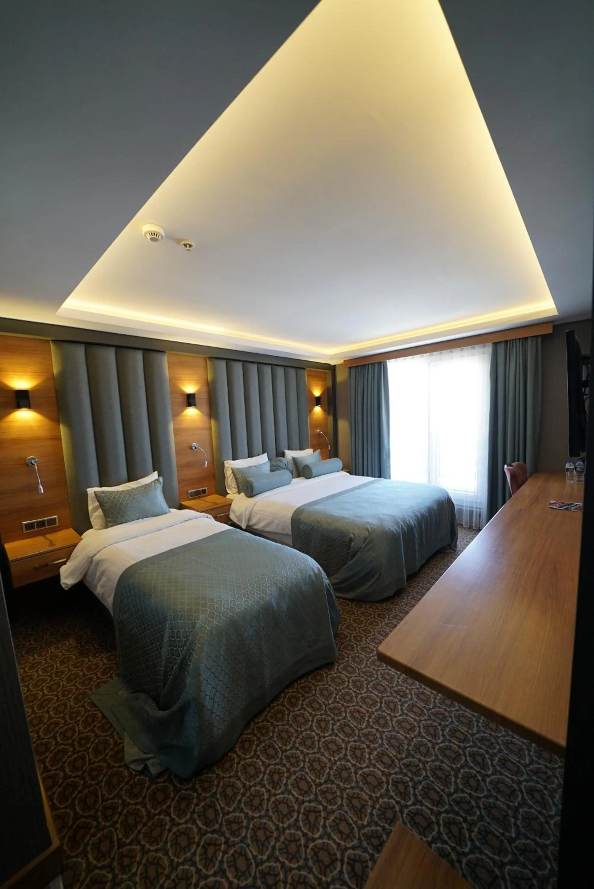 Bed in Green Prusa Hotel