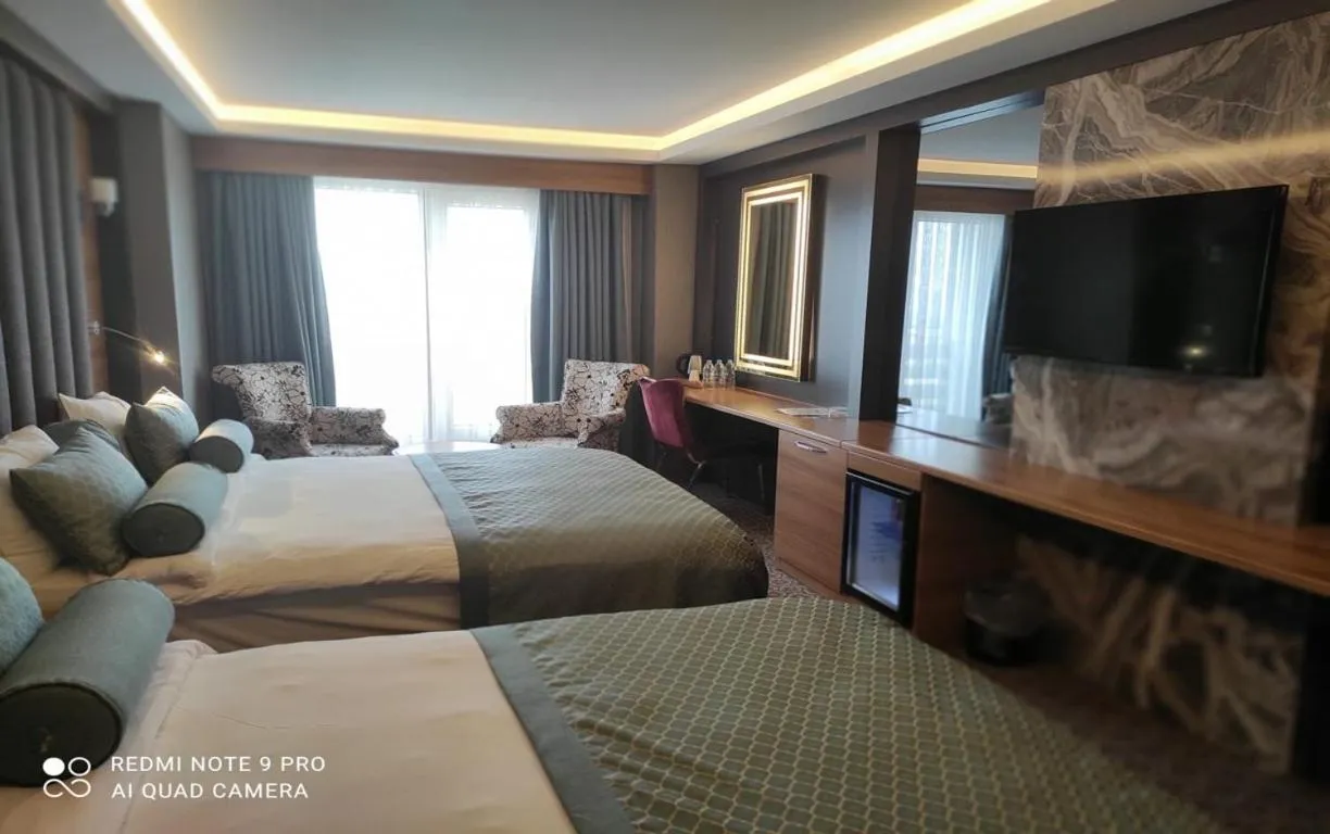 Deluxe Family Room in Green Prusa Hotel