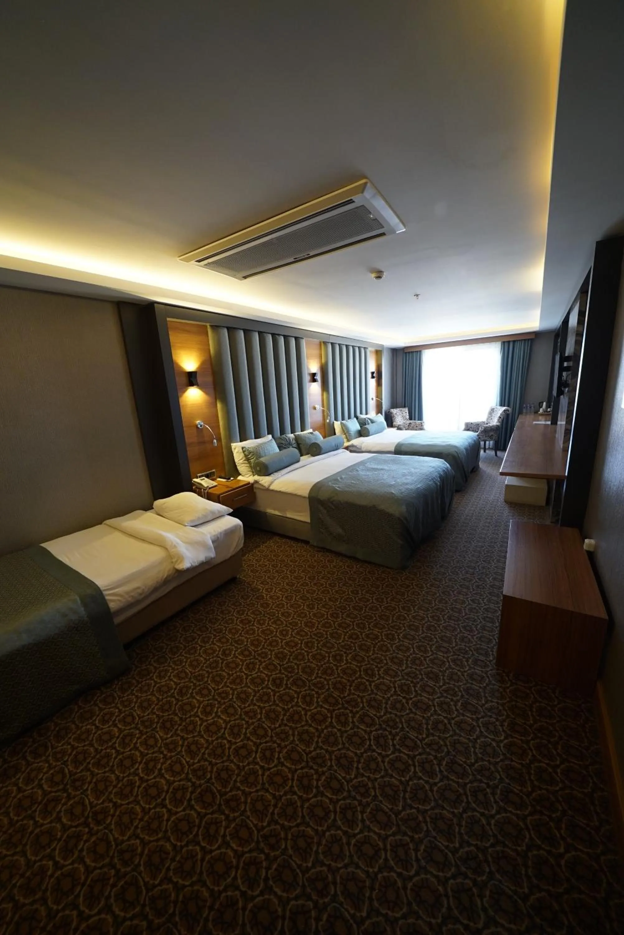 Bed in Green Prusa Hotel