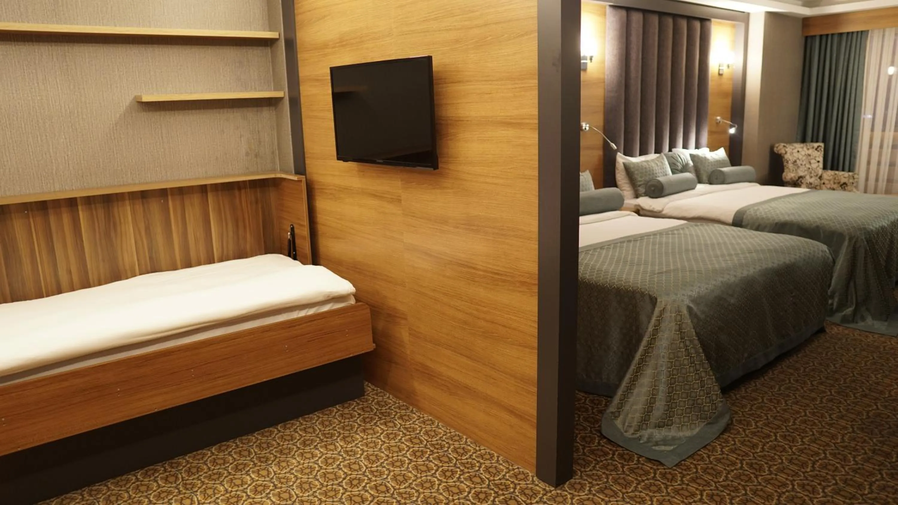 Bed in Green Prusa Hotel