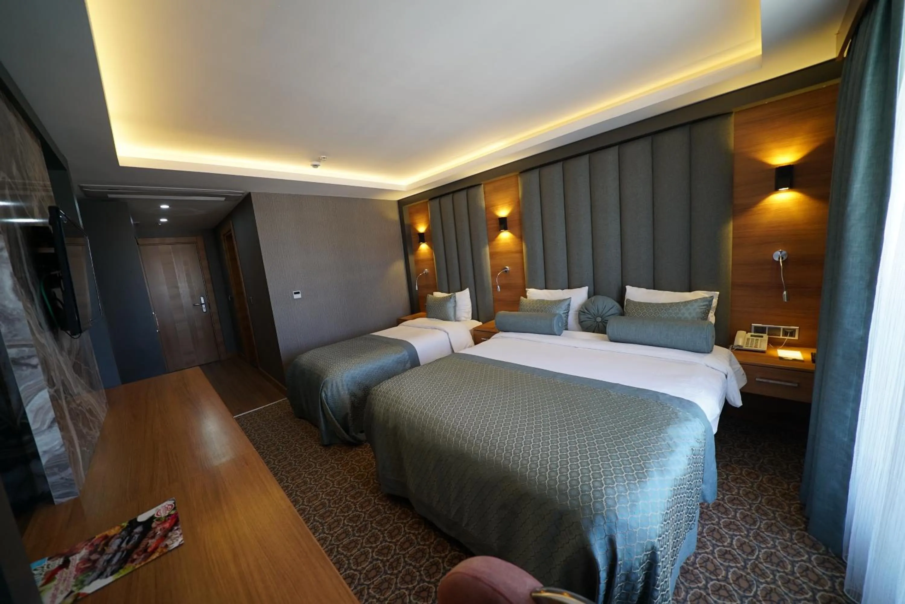 Bed in Green Prusa Hotel