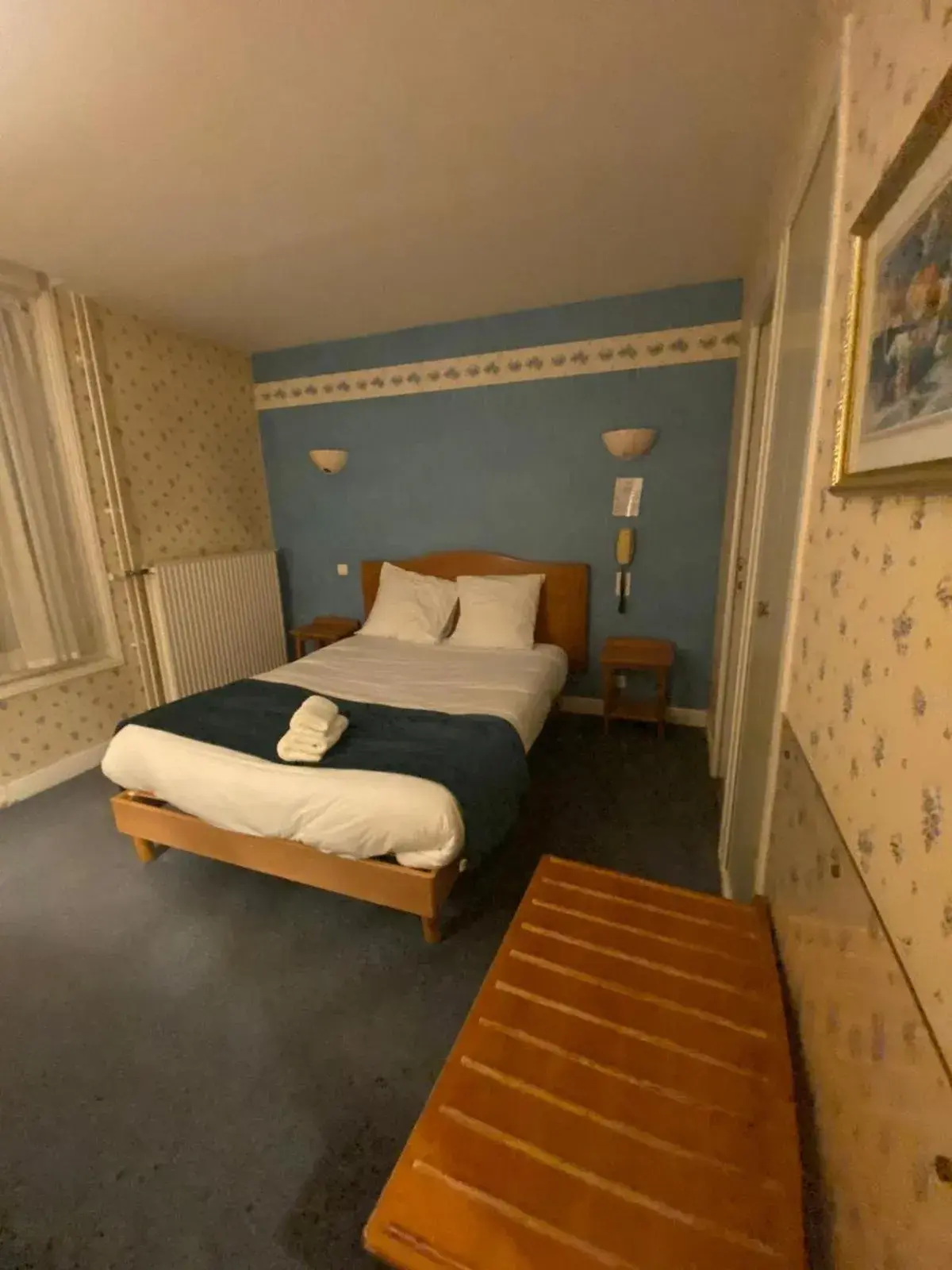 Bed in Logis Grand Hôtel De L'Europe Bed in Logis Grand Hôtel De L'Europe