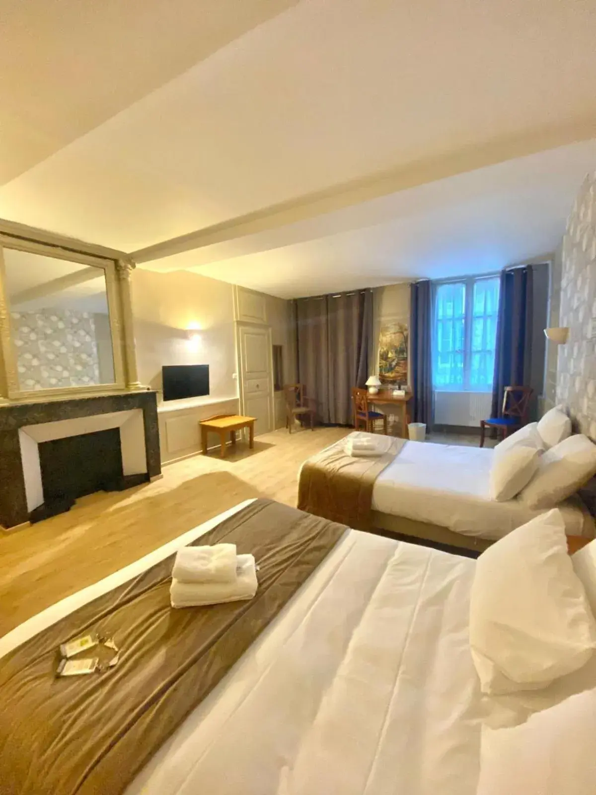 Bed in Logis Grand Hôtel De L'Europe Bed in Logis Grand Hôtel De L'Europe