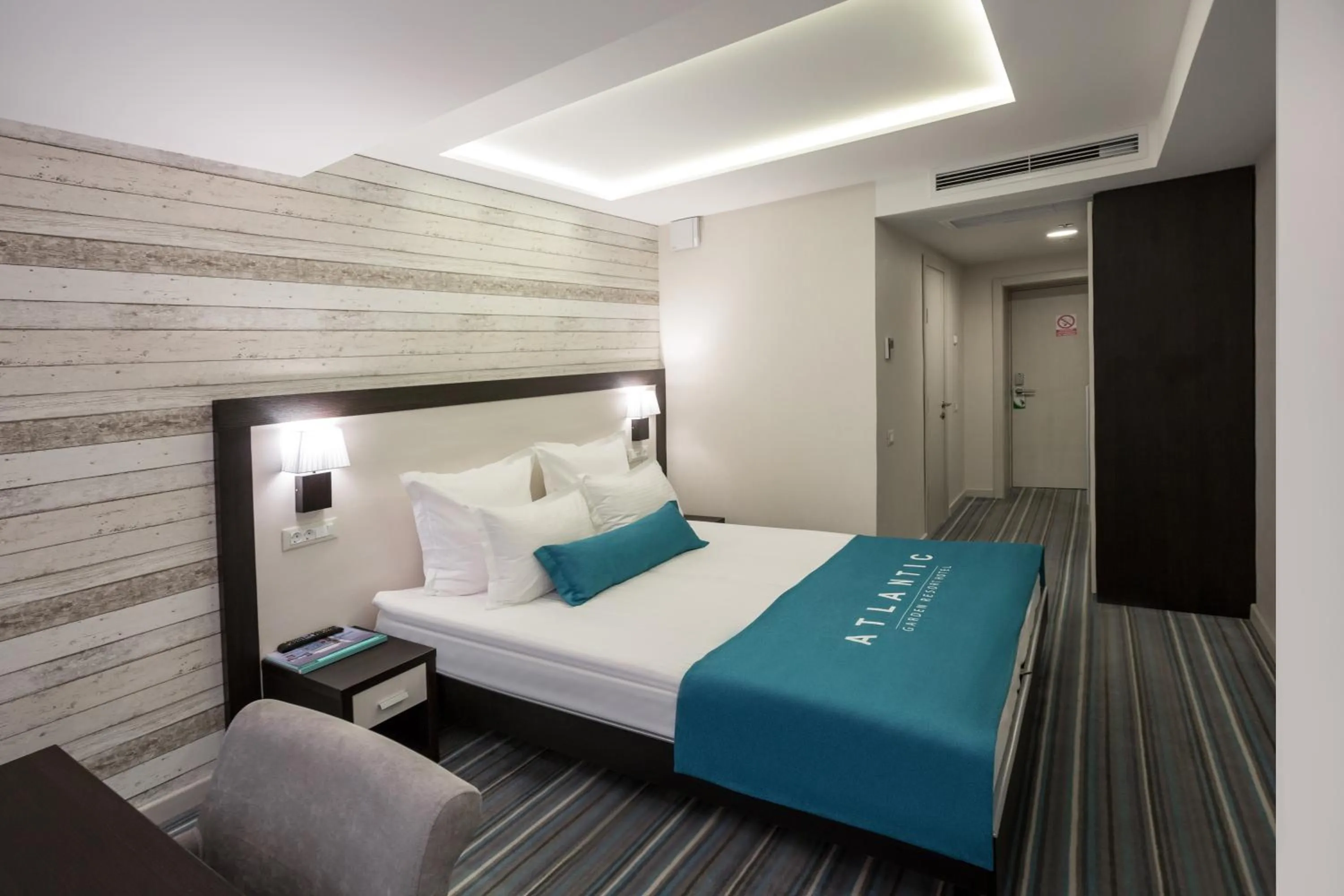 Bed in Atlantic Garden Resort