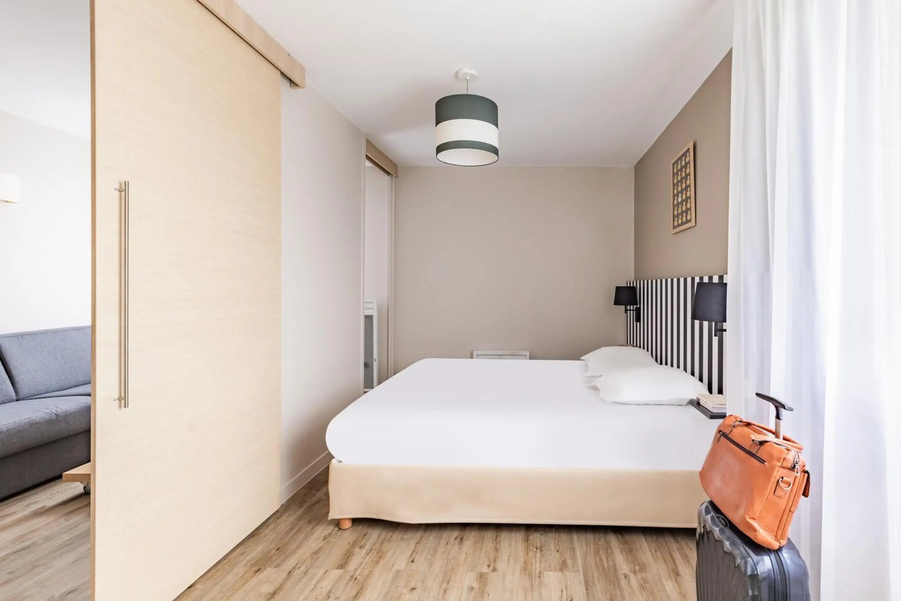 Bedroom, Bed in Appart'City Classic Reims Parc des Expositions Bedroom, Bed in Appart'City Classic Reims Parc des Expositions