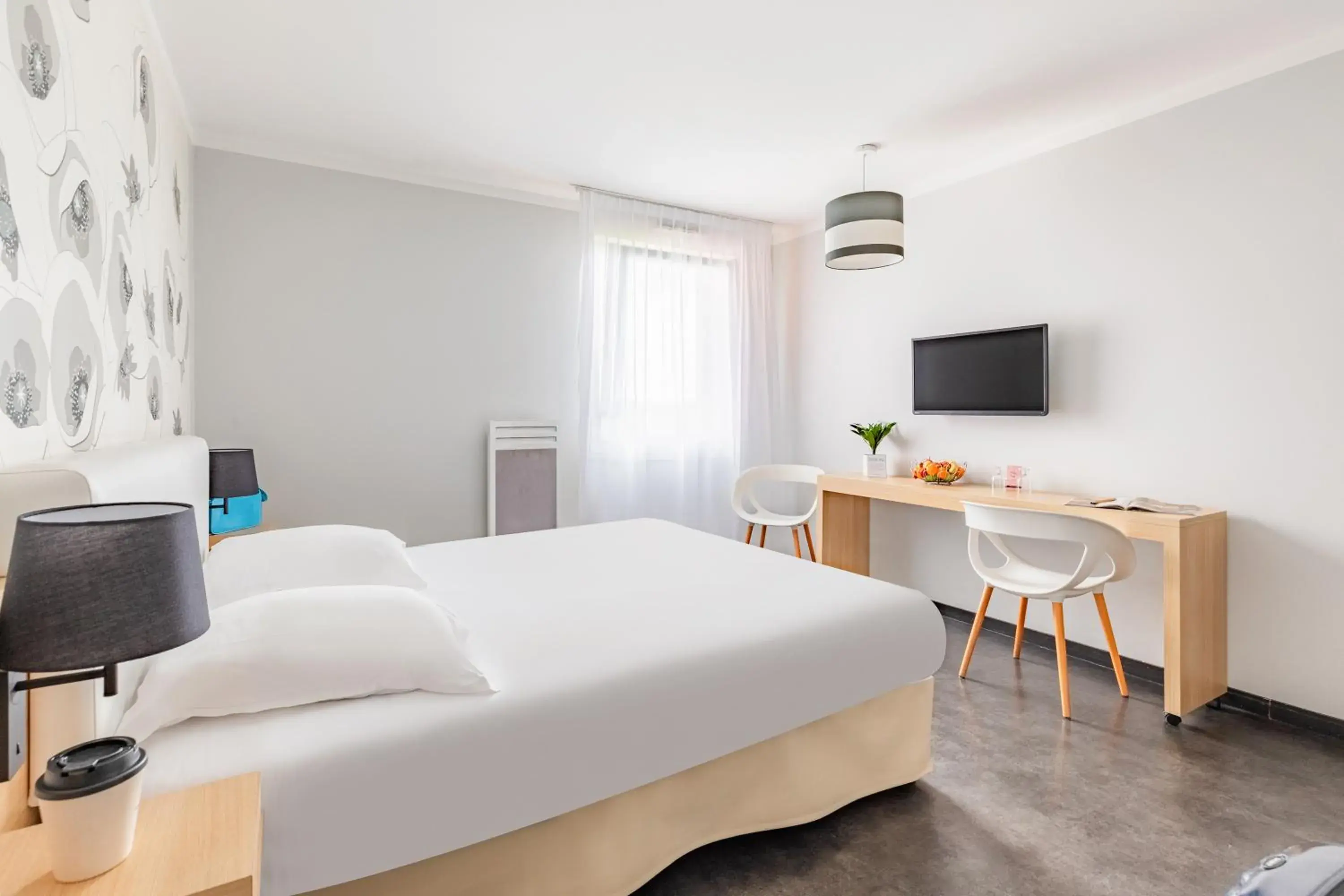 Bedroom, Bed in Appart'City Classic Reims Parc des Expositions Bedroom, Bed in Appart'City Classic Reims Parc des Expositions