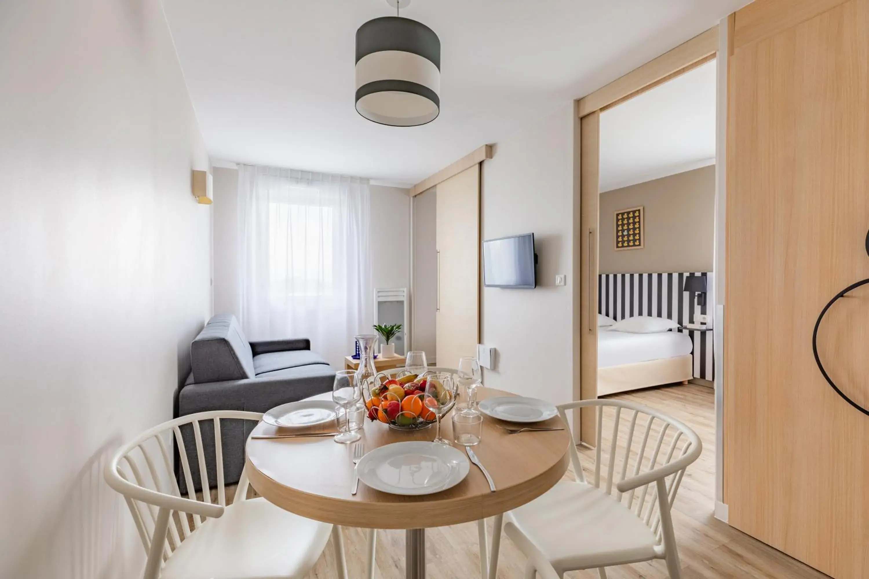 Bedroom in Appart'City Classic Reims Parc des Expositions Bedroom in Appart'City Classic Reims Parc des Expositions