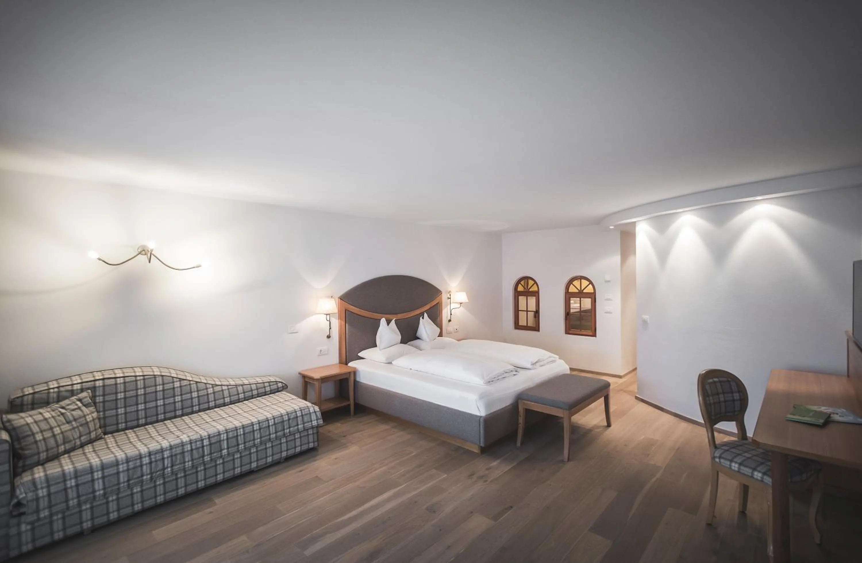 Bed in Hotel Alpenhof