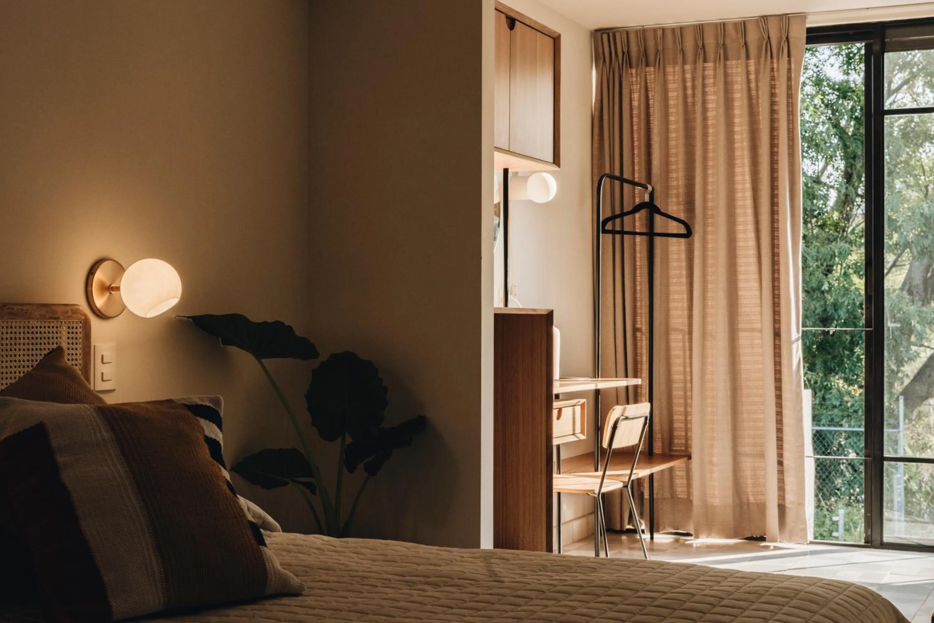 Bed in Casa Ixaya by Barrio México