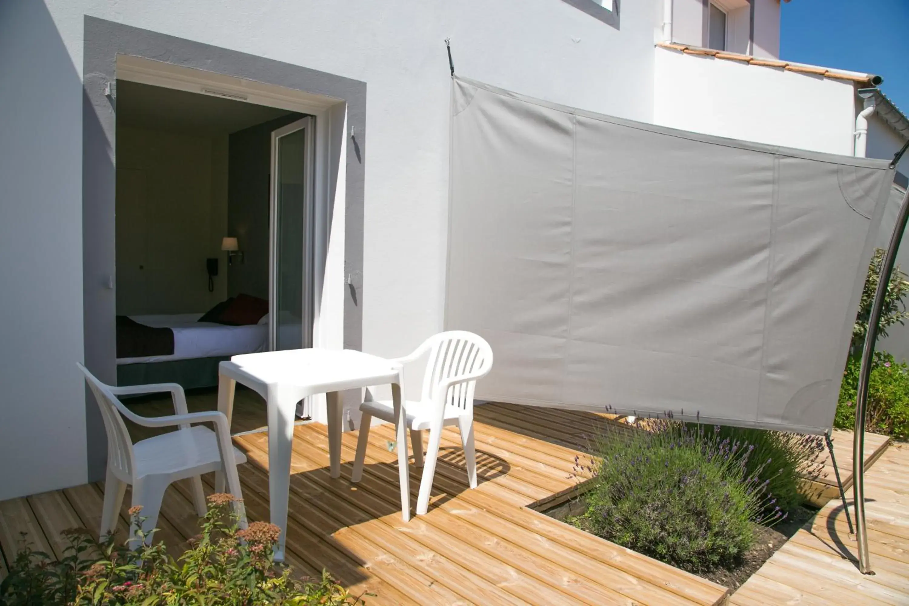 Twin Room with Terrace in La Villa en L'île - 2 Piscines & Spa Twin Room with Terrace in La Villa en L'île - 2 Piscines & Spa