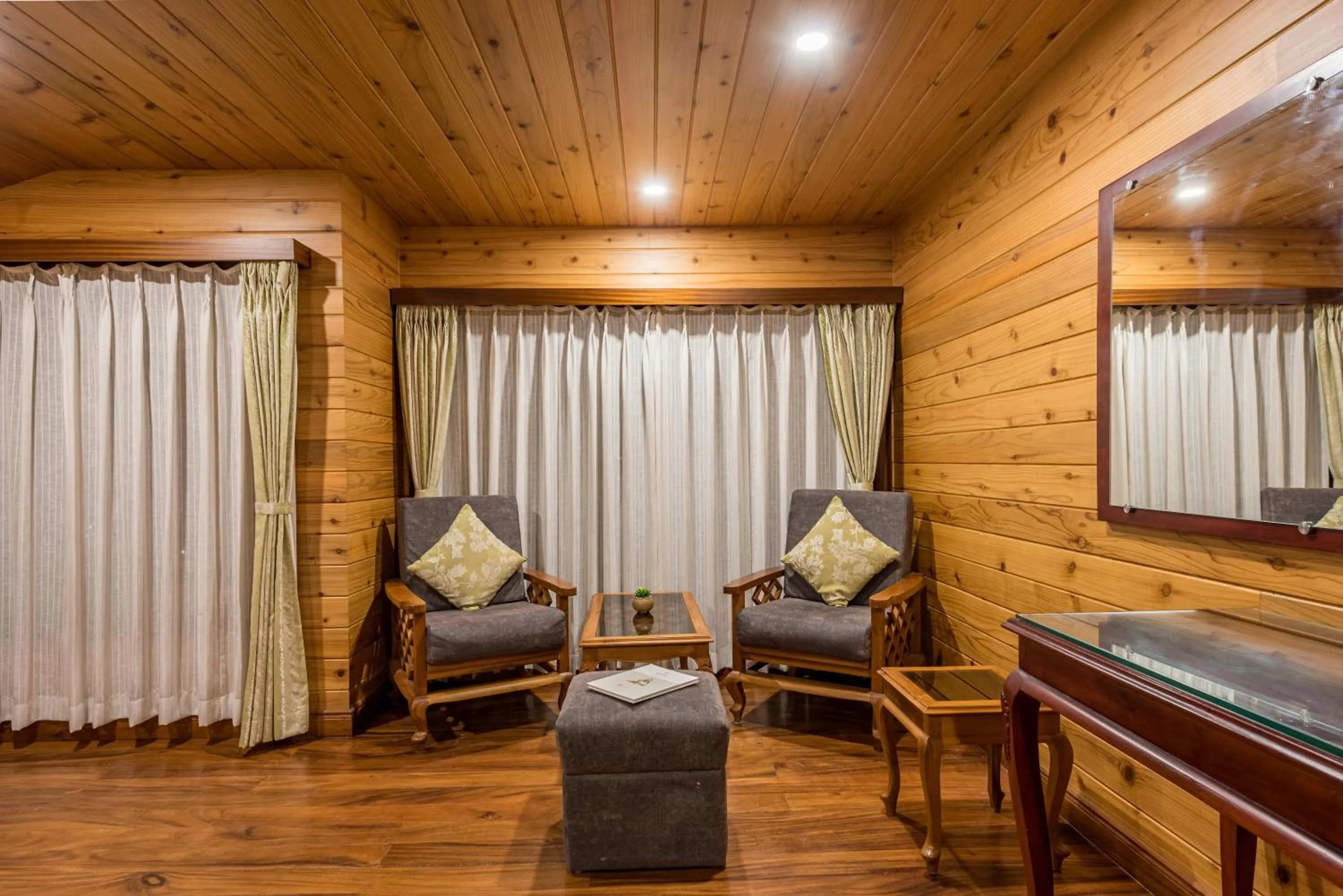 Seating area in Udaan Dekeling Resort, Darjeeling