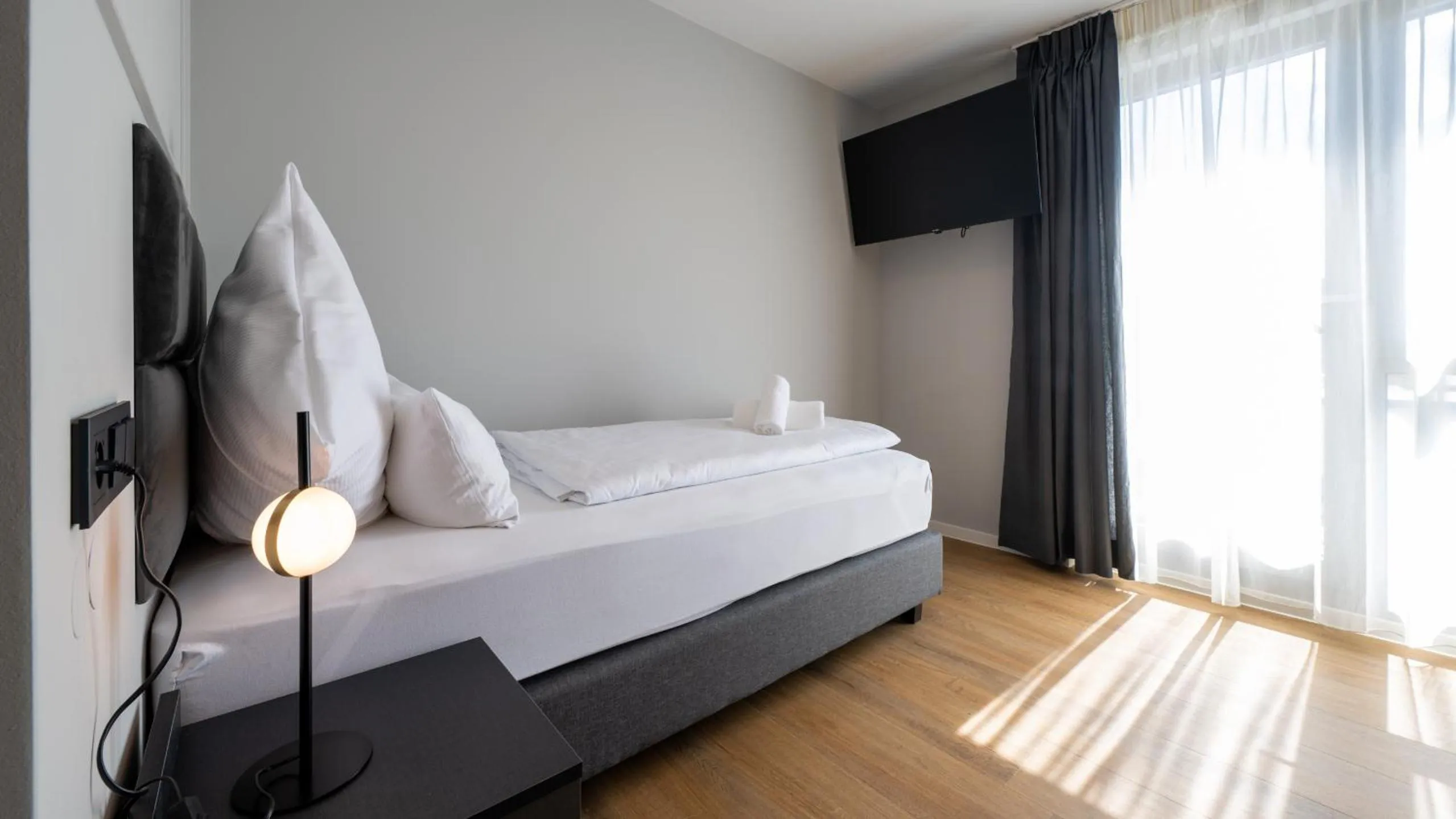 Bed in Hotel Metropol