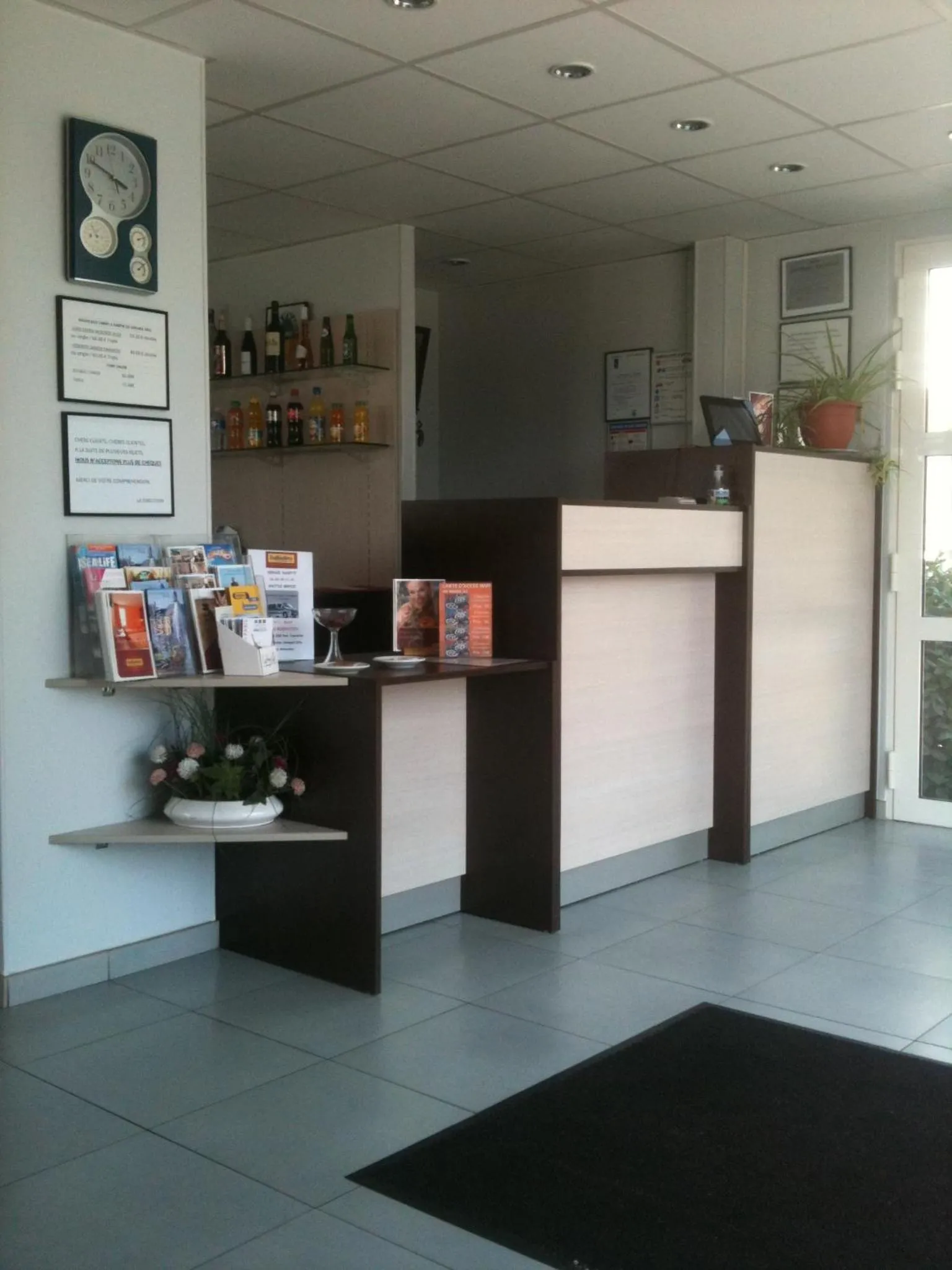 Lobby or reception in initial by balladins Roissy / Saint-Mard