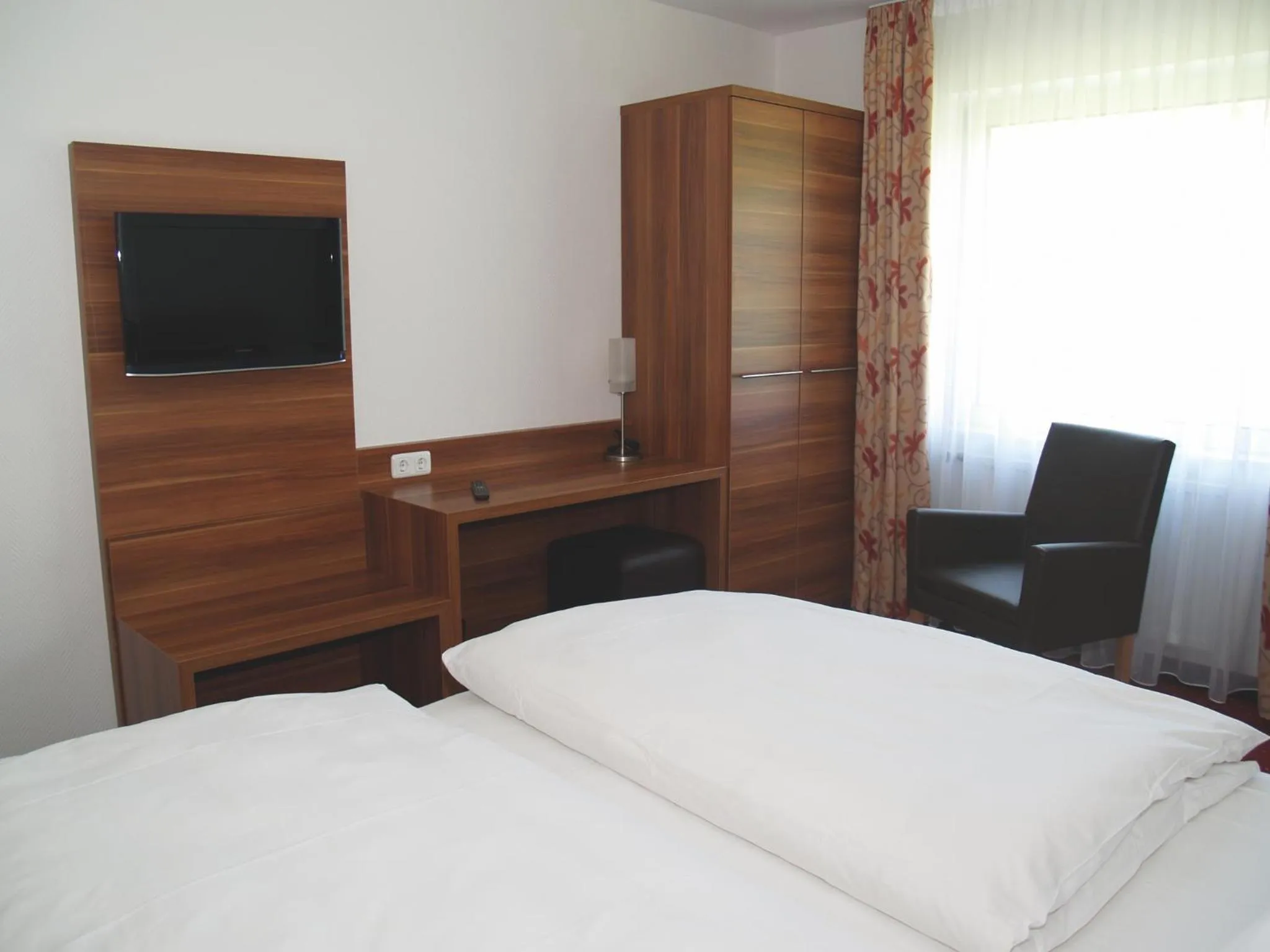 Photo of the whole room, Bed in Hotel Felsenkeller