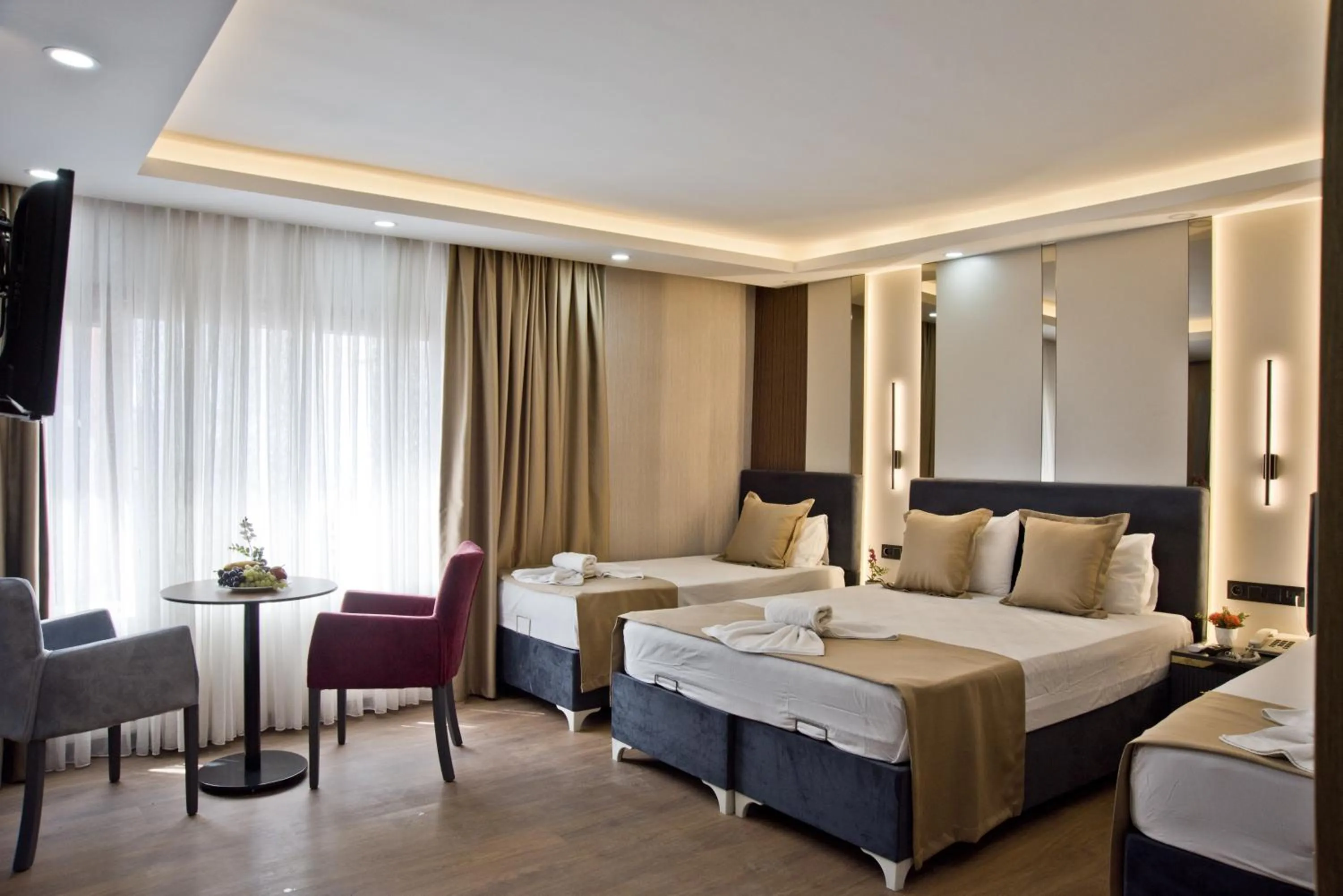 Photo of the whole room, Bed in Grand Bagoz Hotel