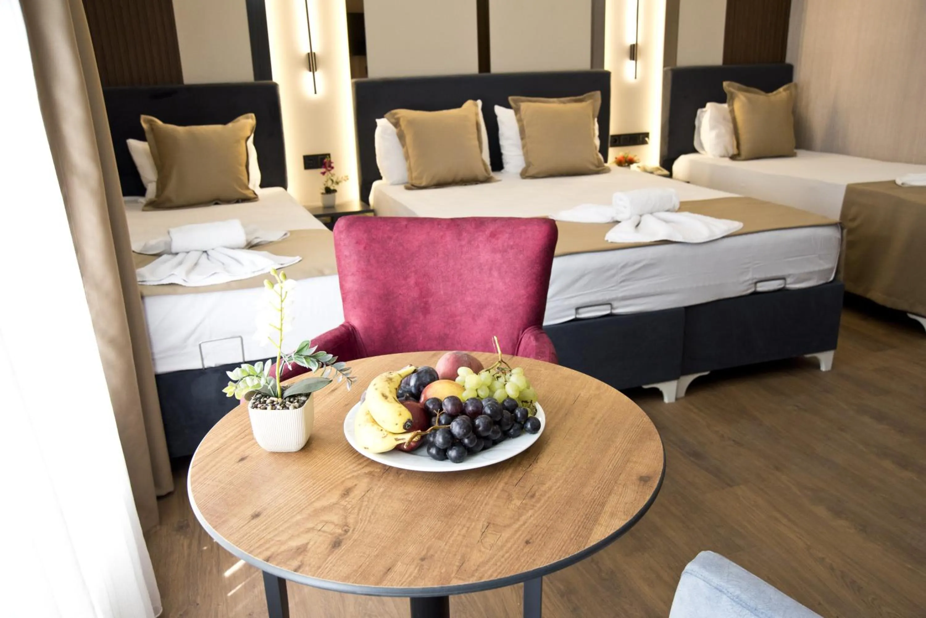 Photo of the whole room, Bed in Grand Bagoz Hotel