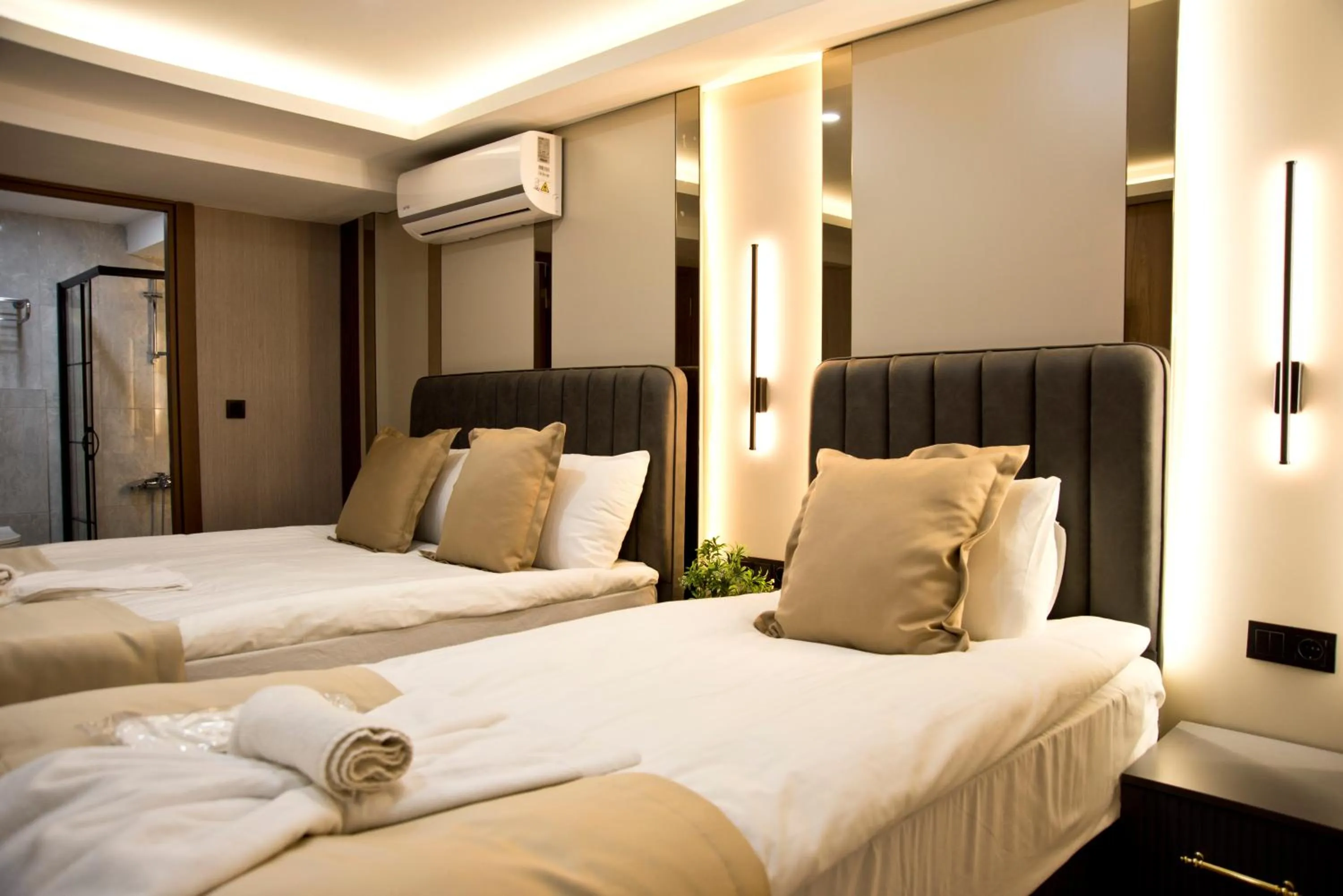 Photo of the whole room, Bed in Grand Bagoz Hotel