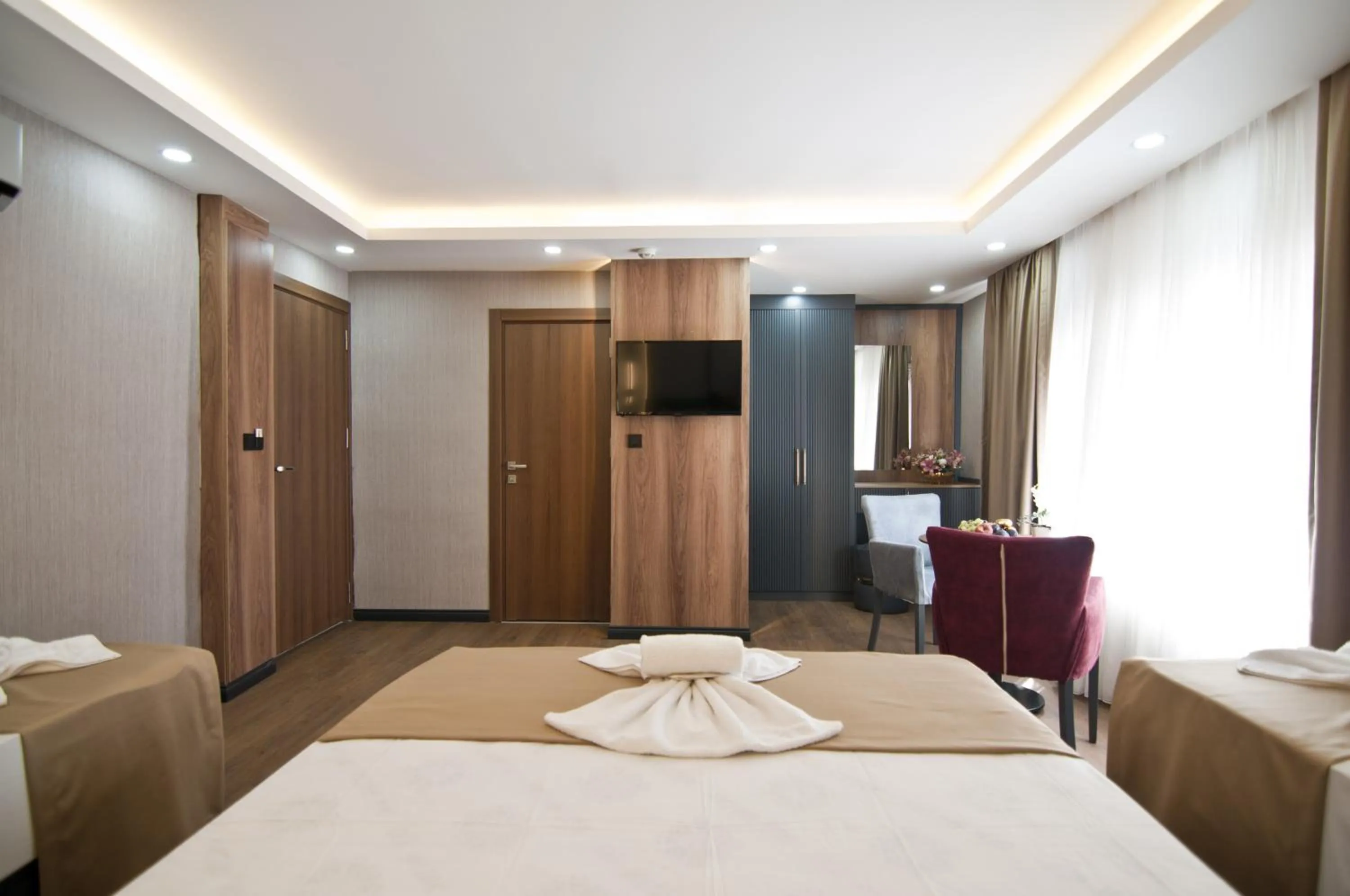 Photo of the whole room, Bed in Grand Bagoz Hotel