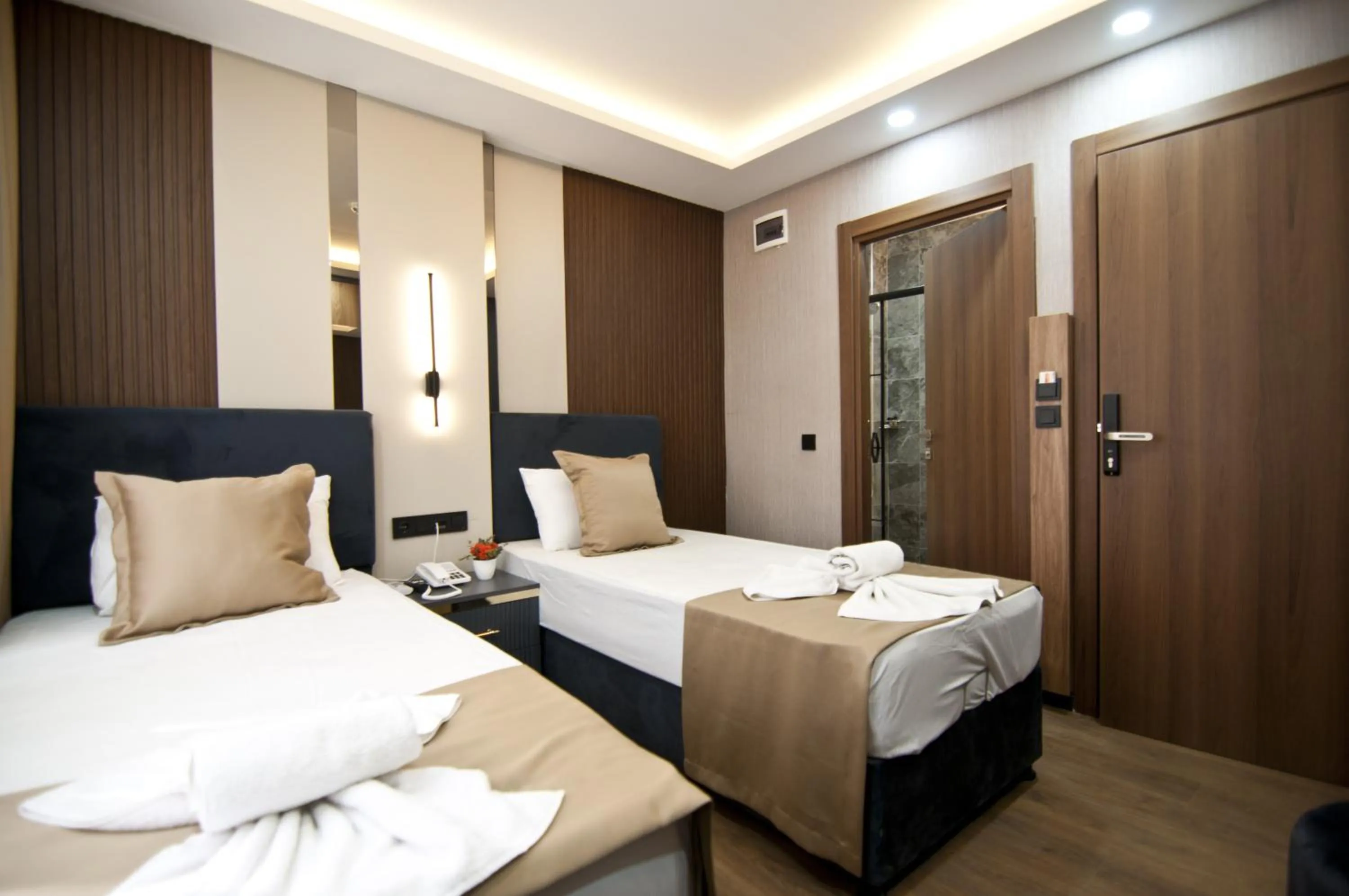 Photo of the whole room, Bed in Grand Bagoz Hotel