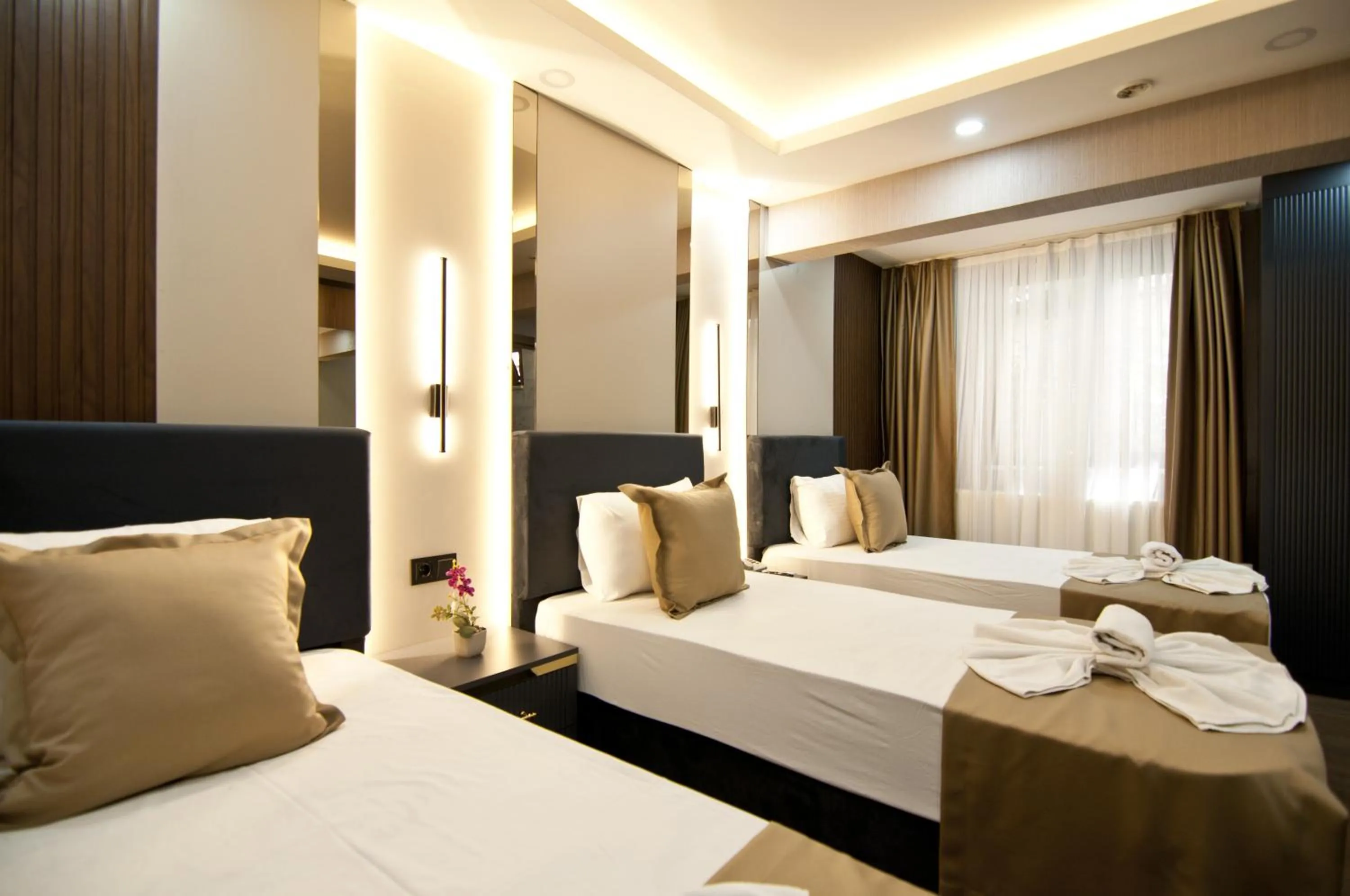 Photo of the whole room, Bed in Grand Bagoz Hotel