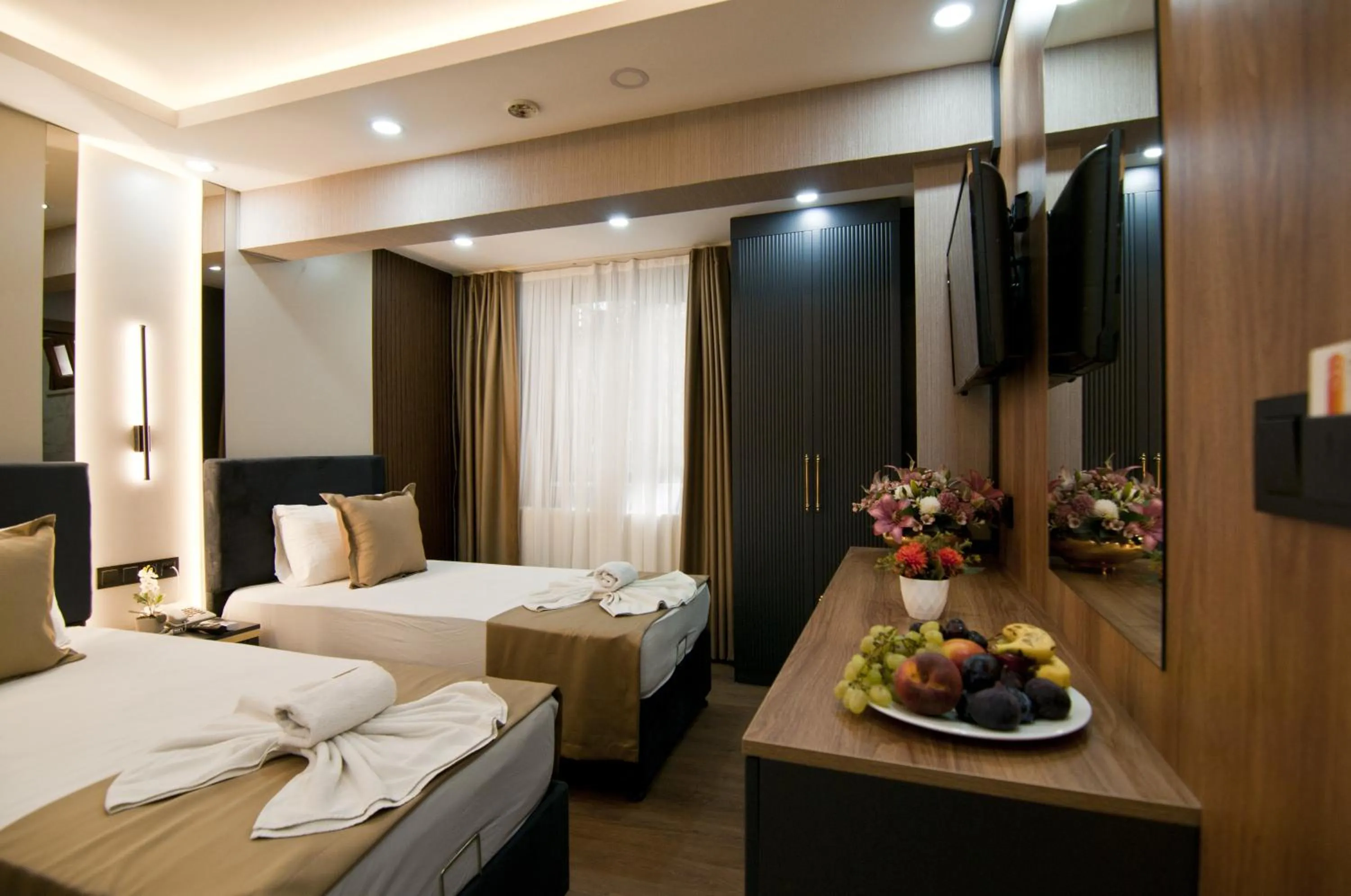 Photo of the whole room, Bed in Grand Bagoz Hotel