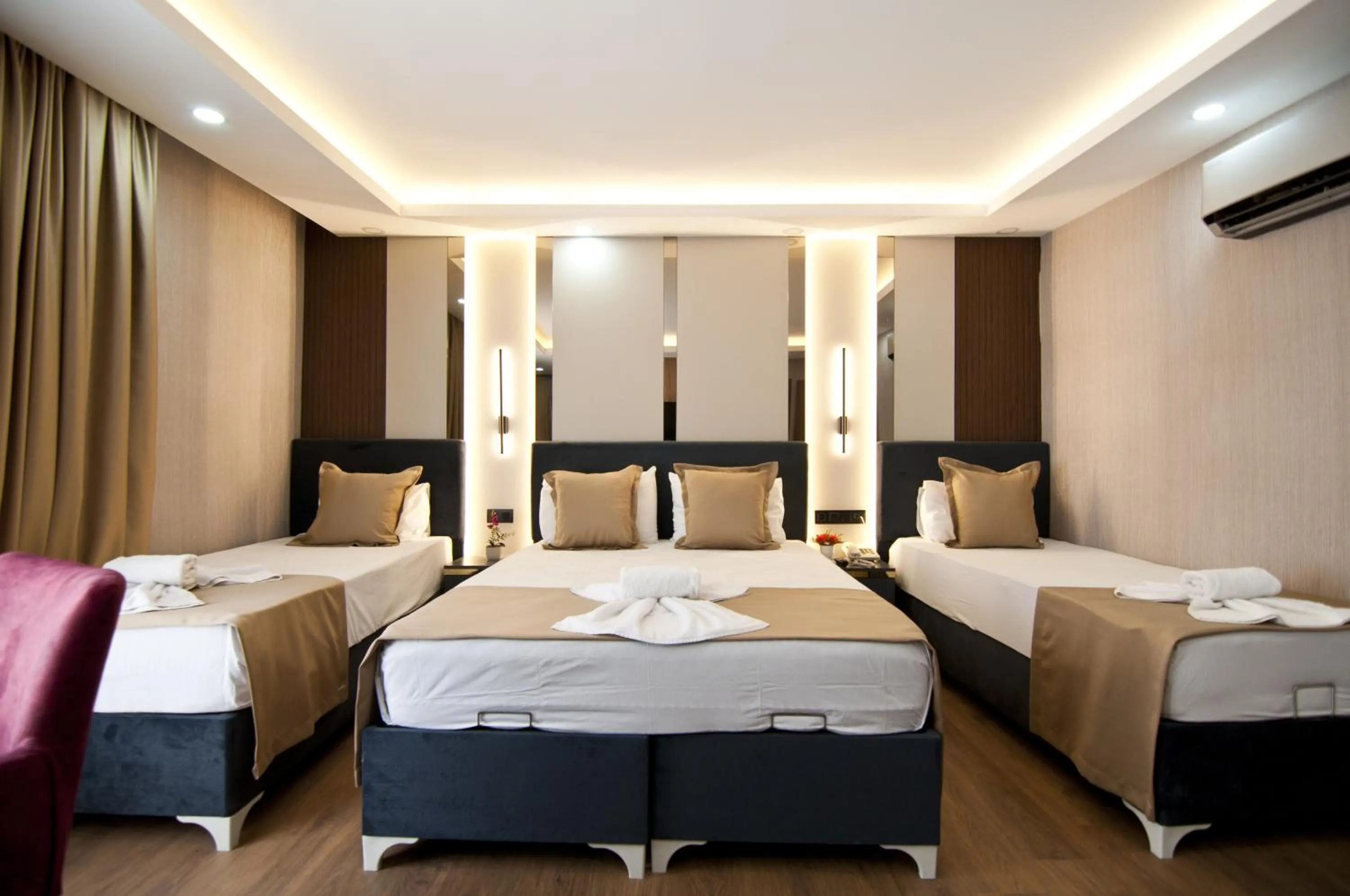 Photo of the whole room, Bed in Grand Bagoz Hotel