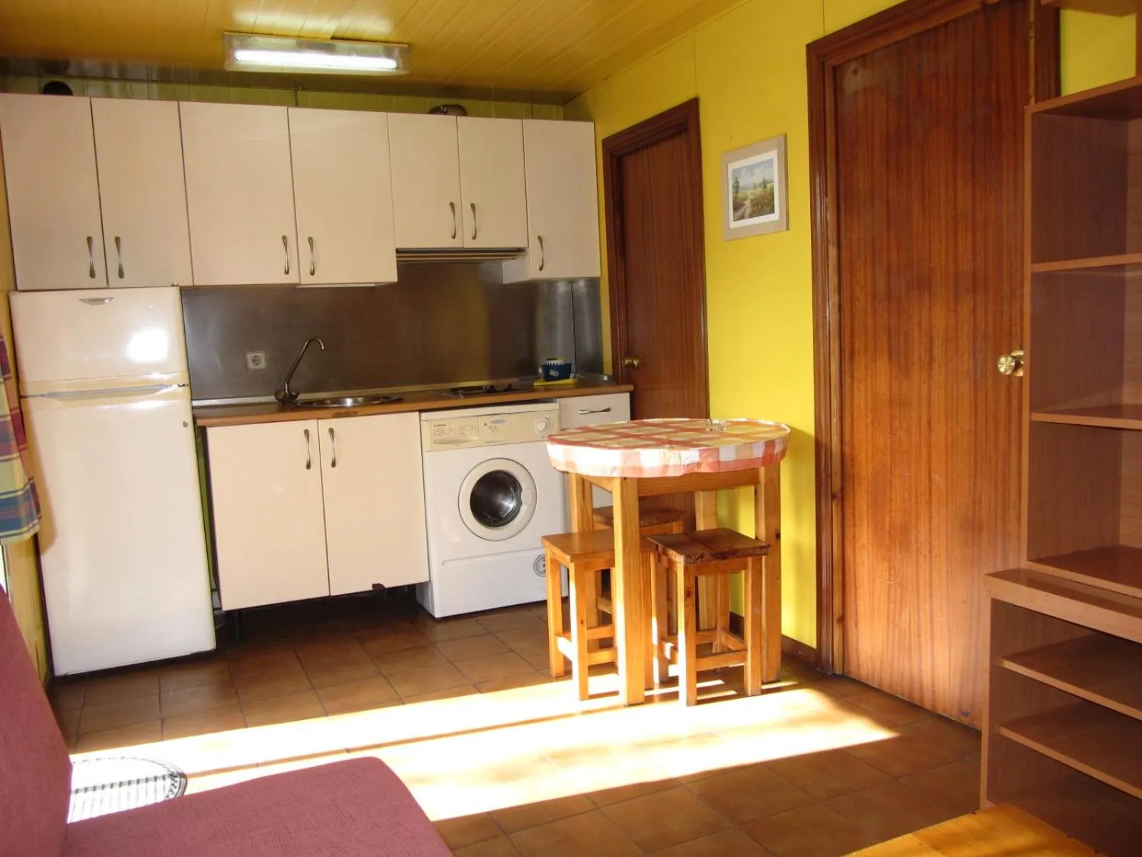 Kitchen or kitchenette in Bungalows Alpha