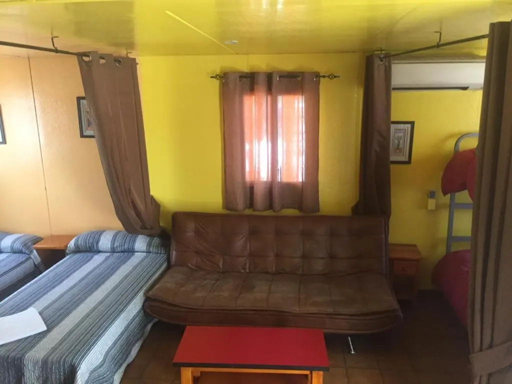 Seating area, Bed in Bungalows Alpha