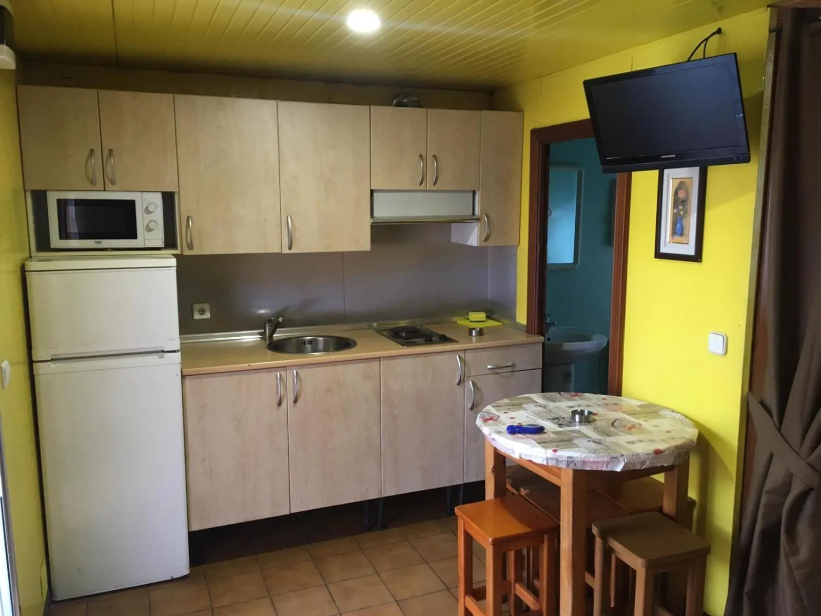 Kitchen or kitchenette in Bungalows Alpha