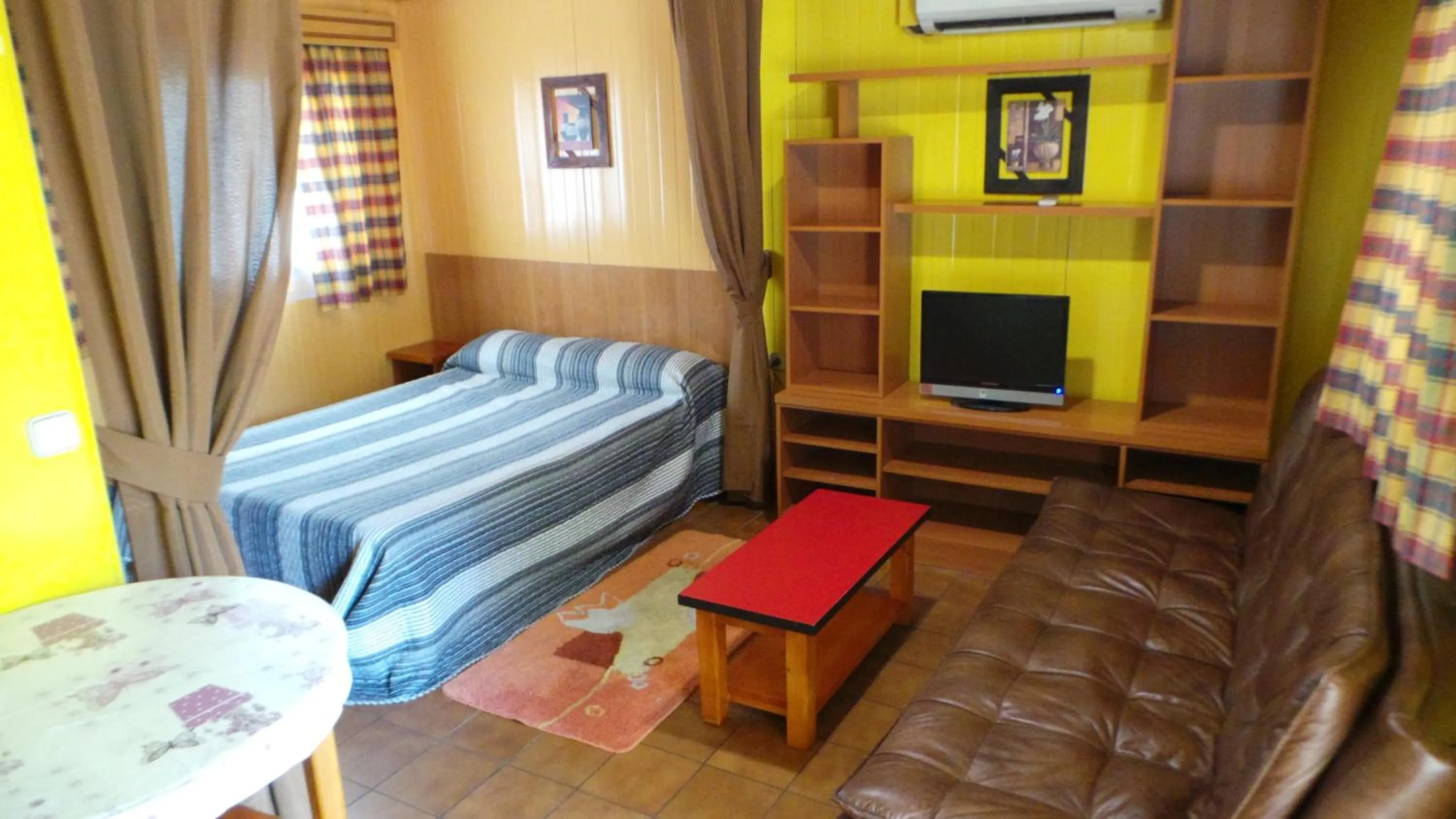 Bed in Bungalows Alpha