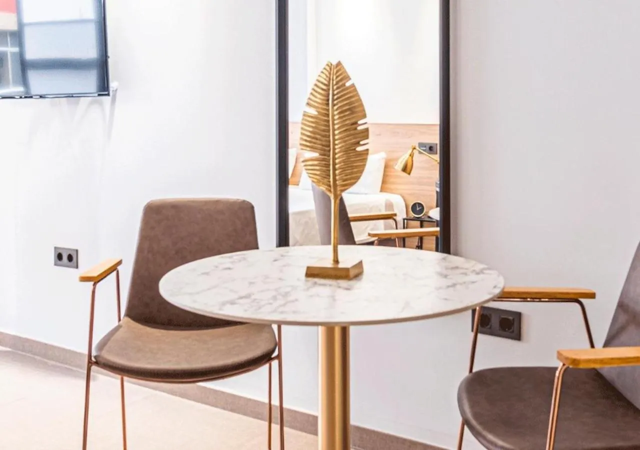 Seating area in Poem Suites, Las Canteras