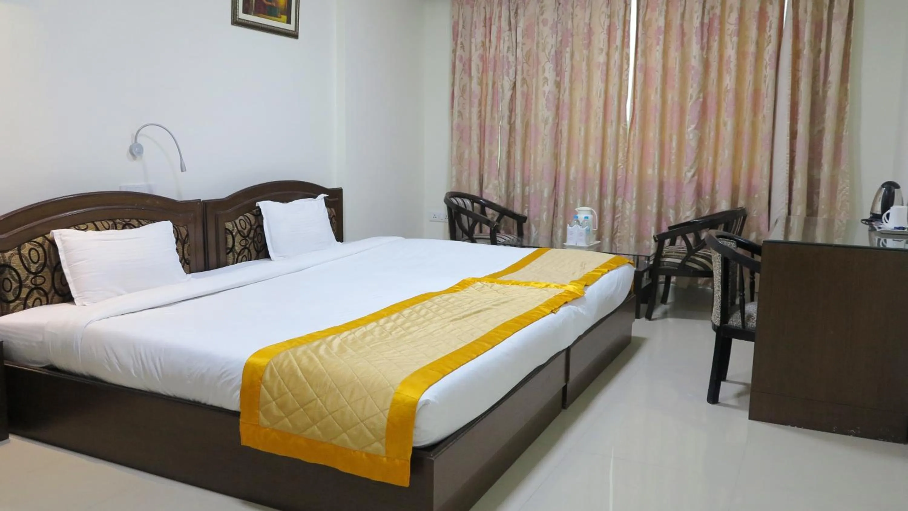 Bed in Bodhgaya Regency Hotel