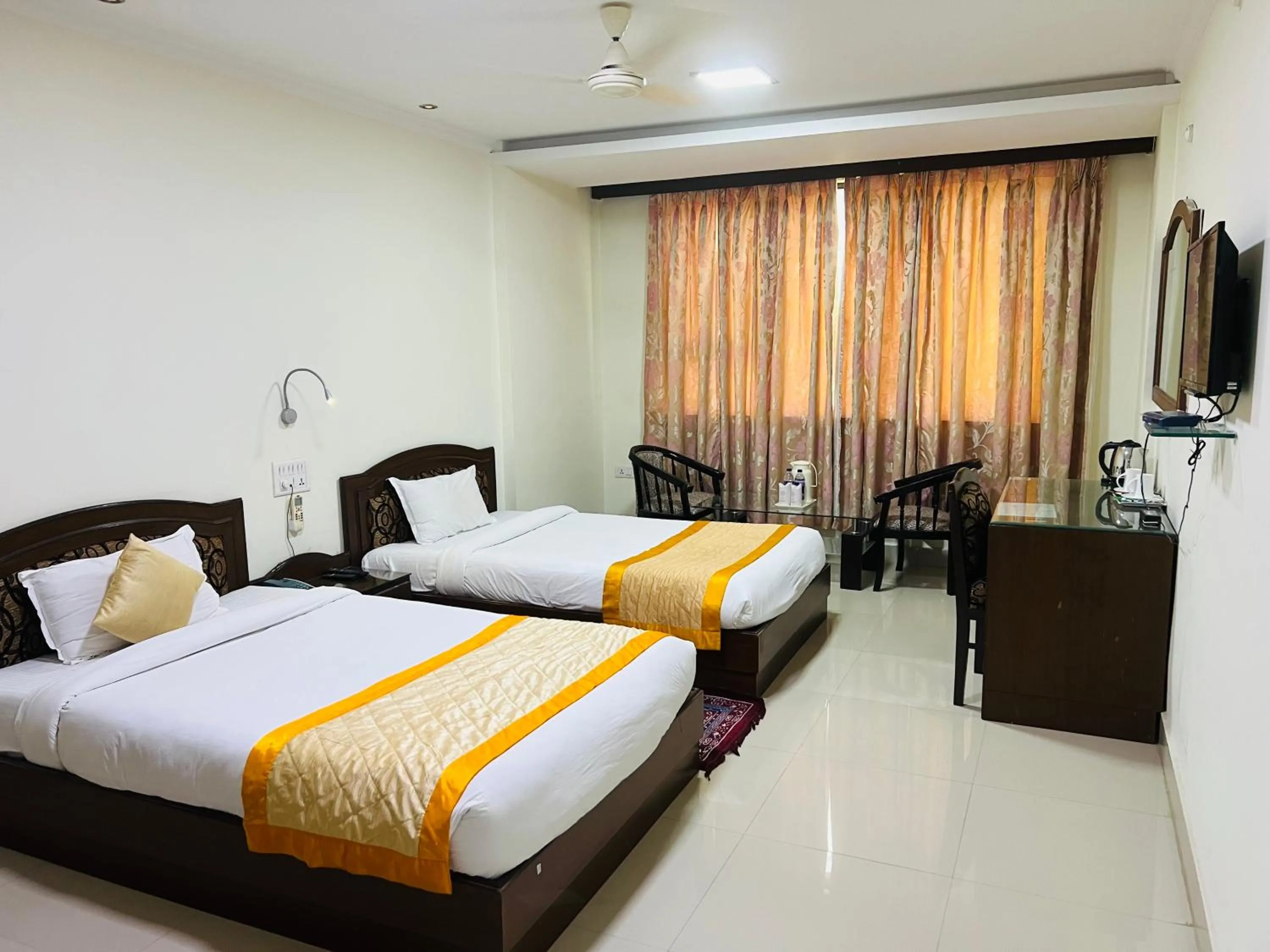 Bed in Bodhgaya Regency Hotel