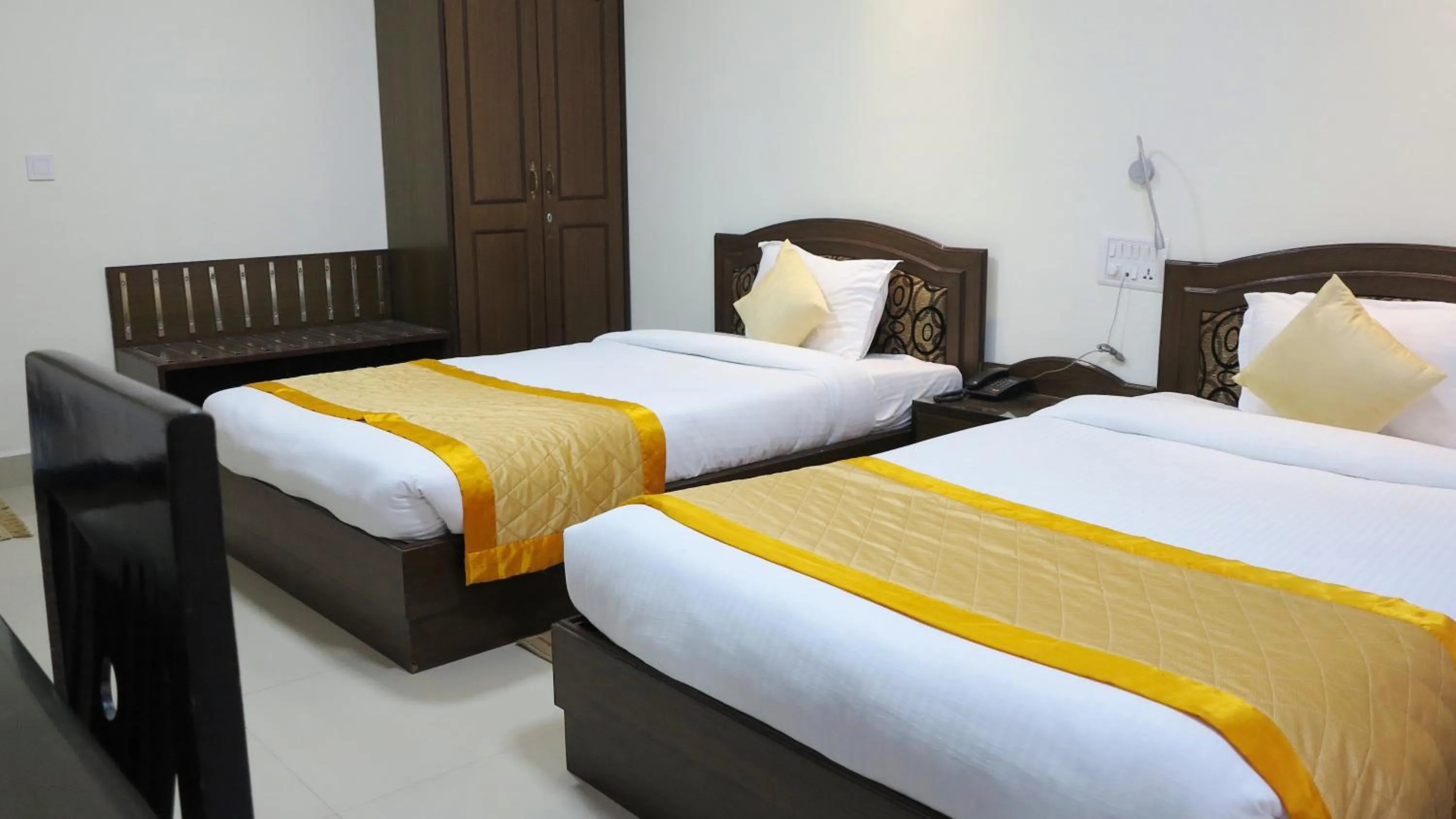 Bed in Bodhgaya Regency Hotel