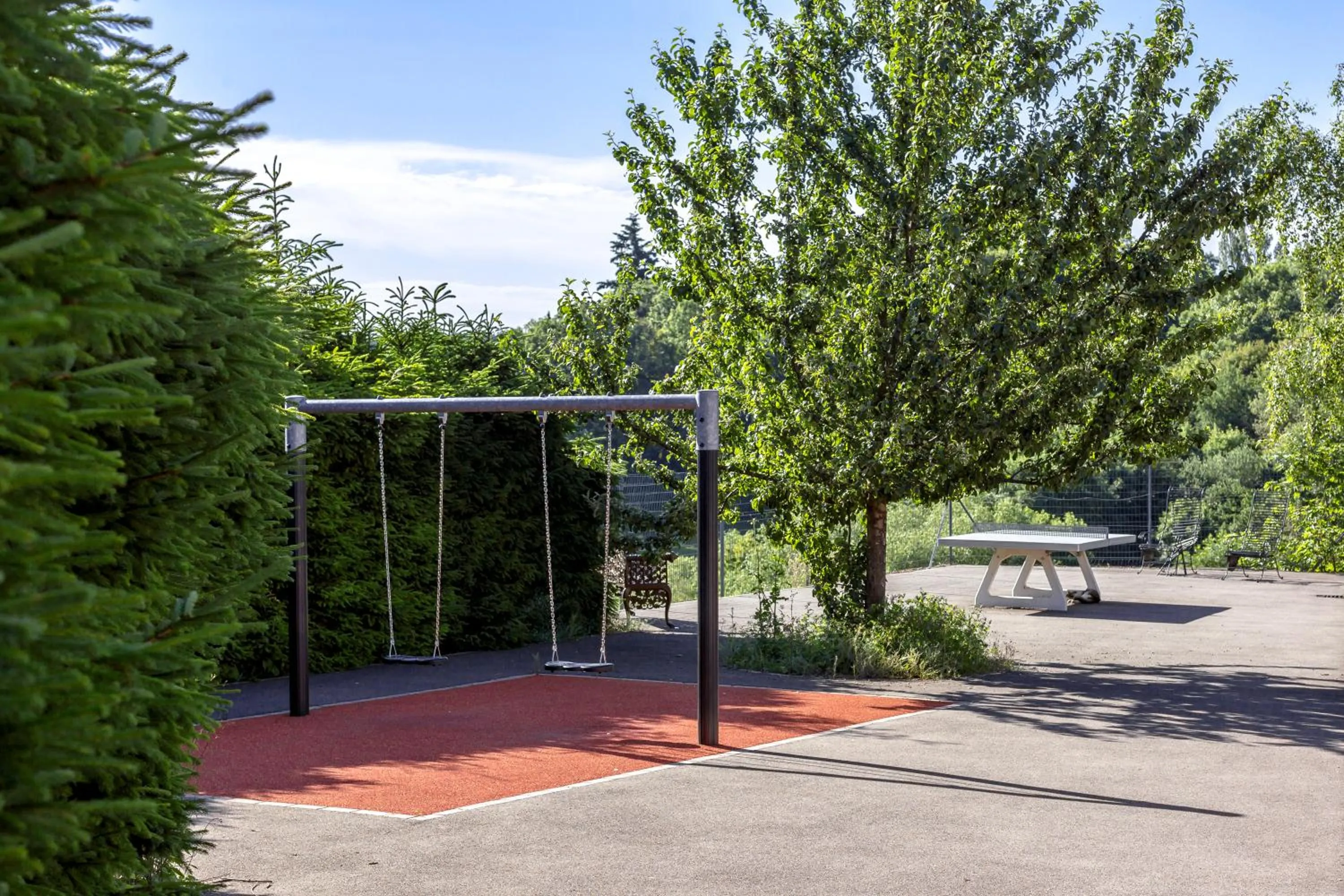 Children play ground in Hôtel Restaurant et Spa Au Tilleul