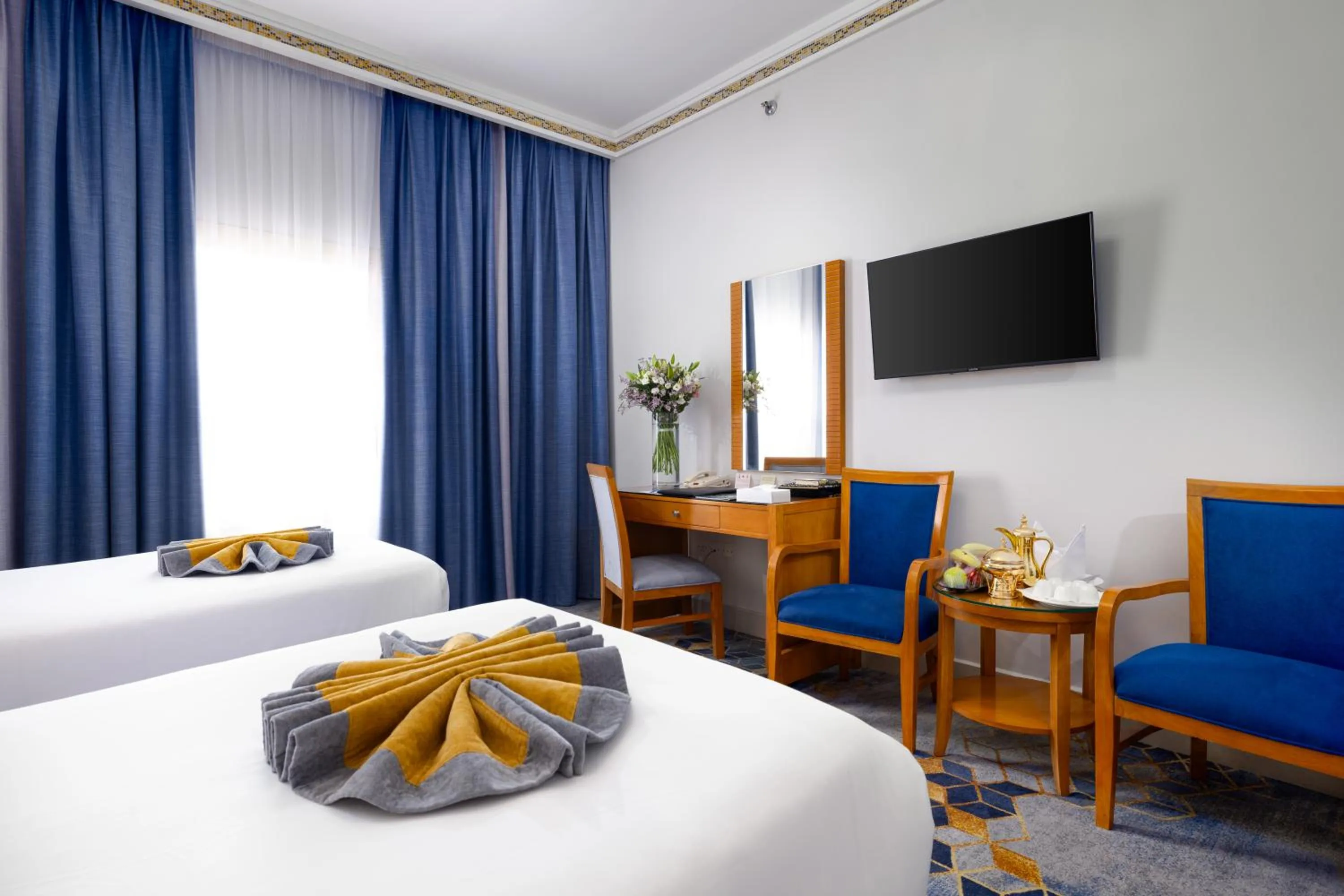 Bedroom, Bed in Emaar Grand Hotel