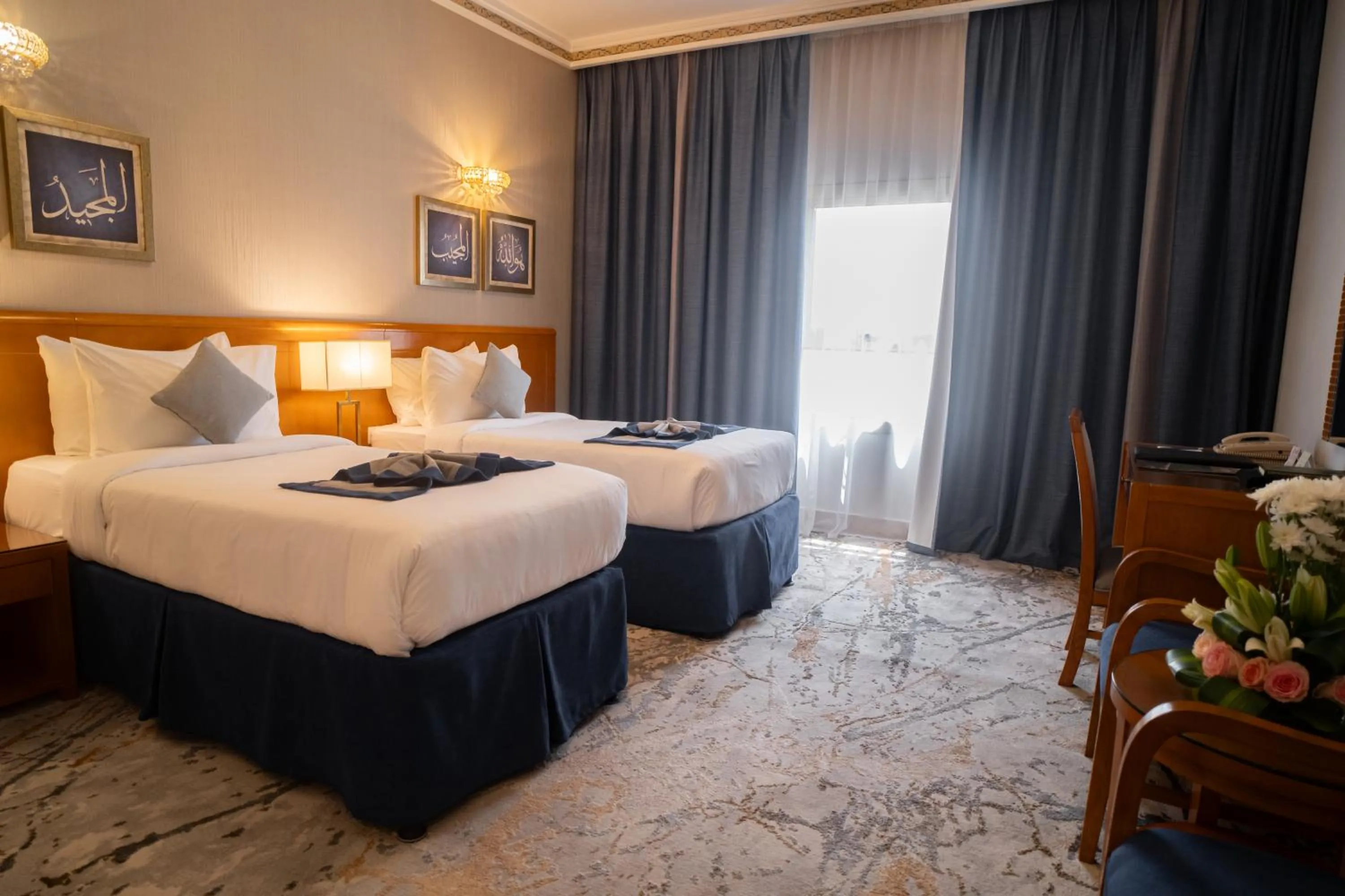 Bed in Emaar Grand Hotel