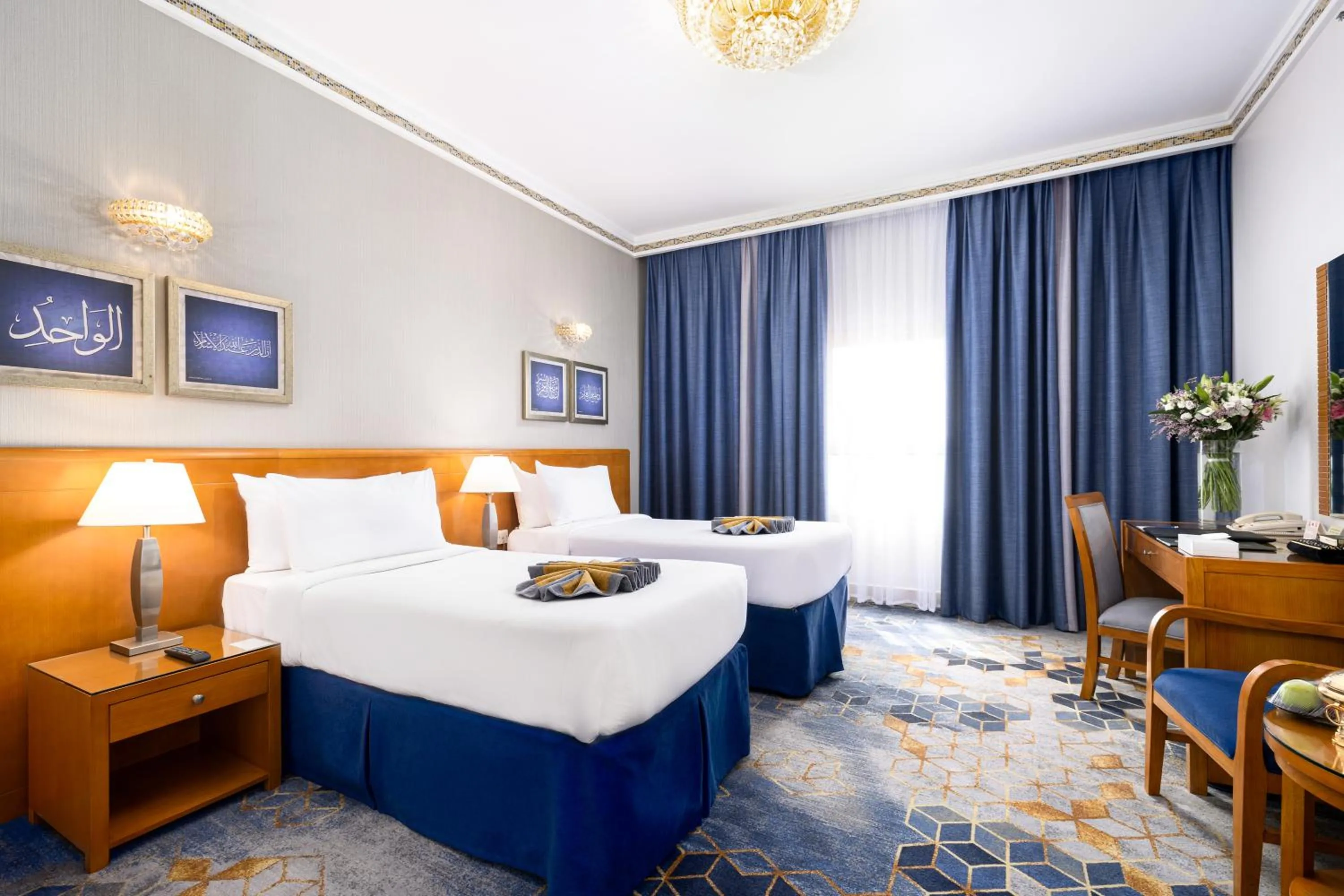 Bed in Emaar Grand Hotel