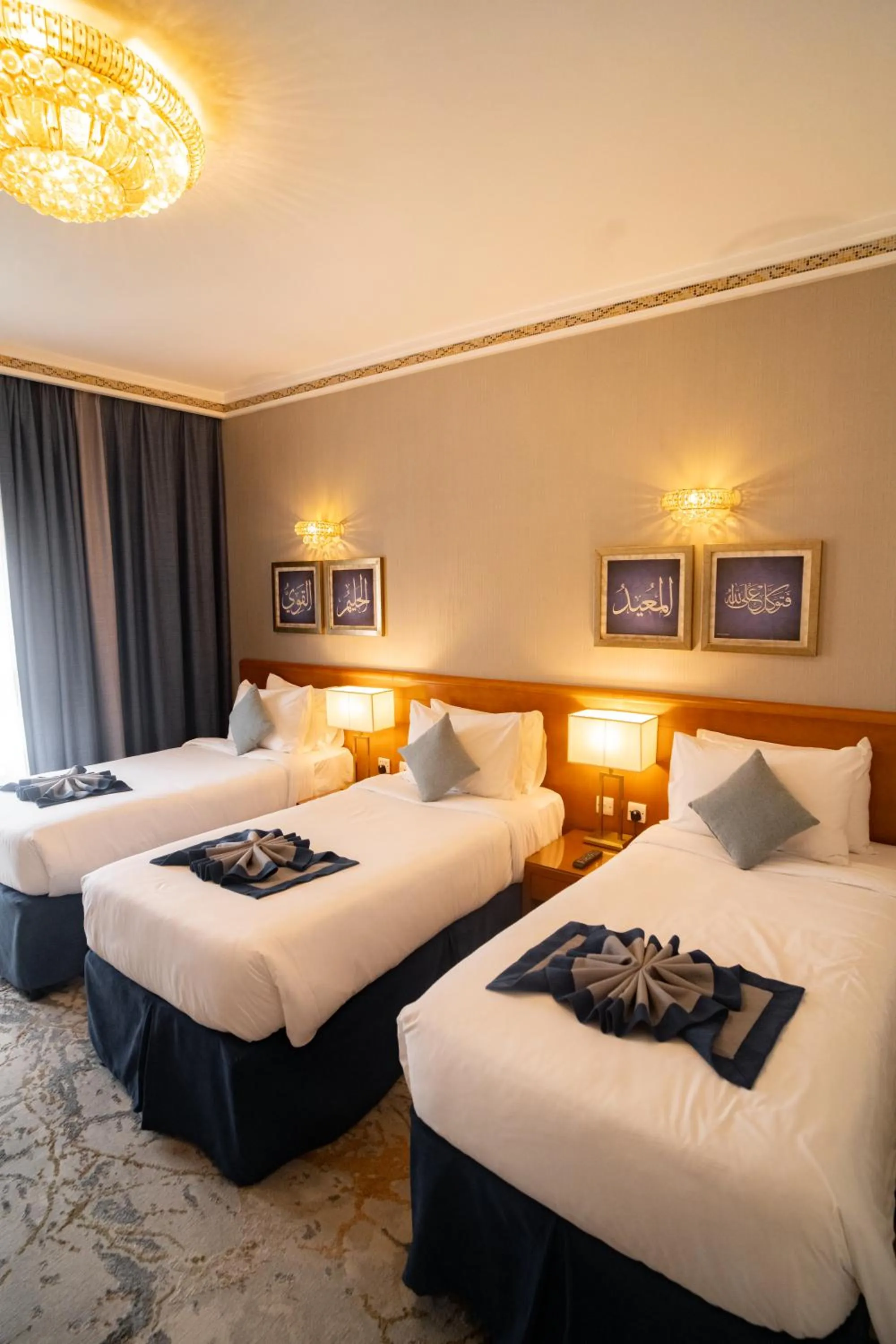 Bedroom, Bed in Emaar Grand Hotel