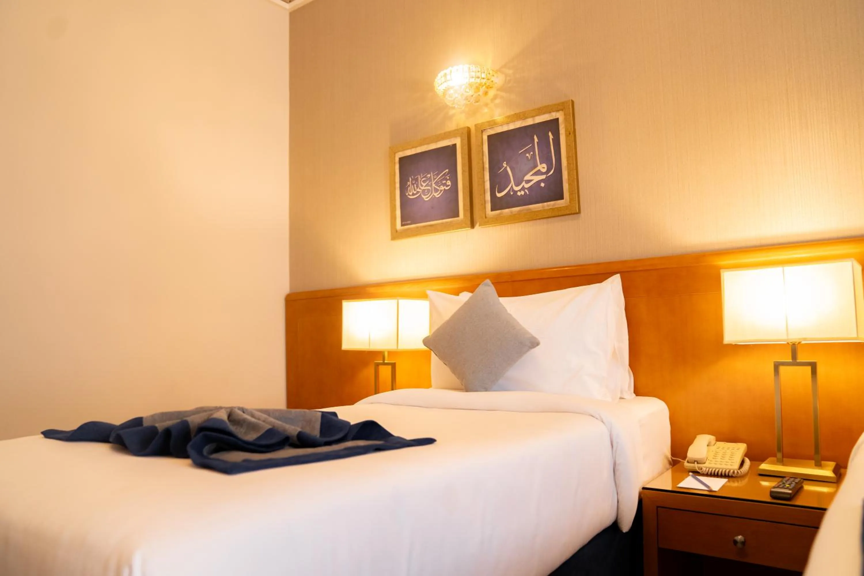 Bed in Emaar Grand Hotel