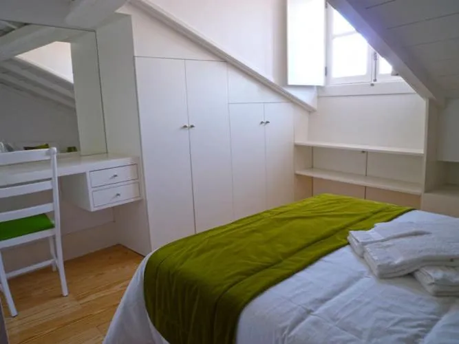 Decorative detail, Bed in Guimarães Studios Lounge
