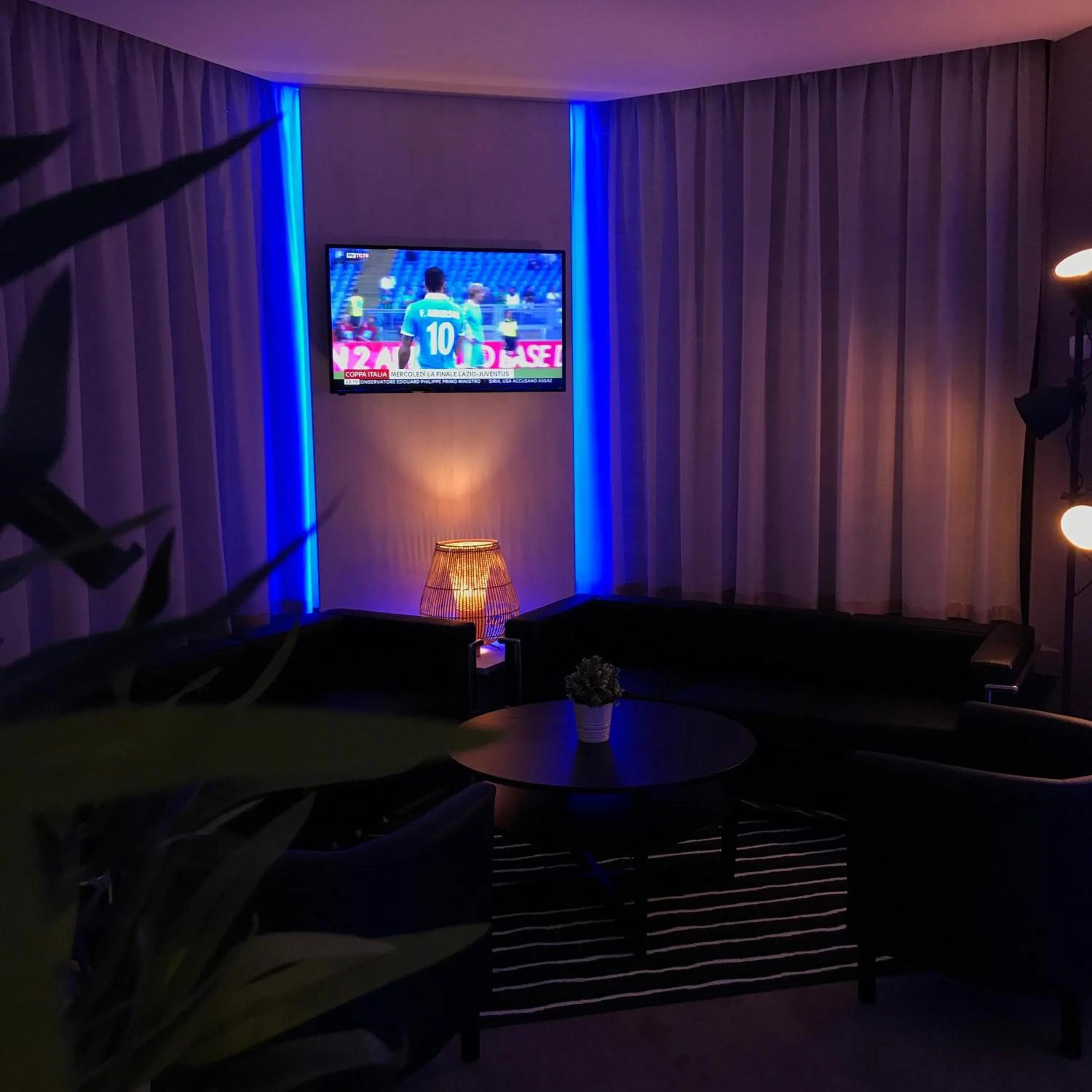 Communal lounge/ TV room in NovaHotel