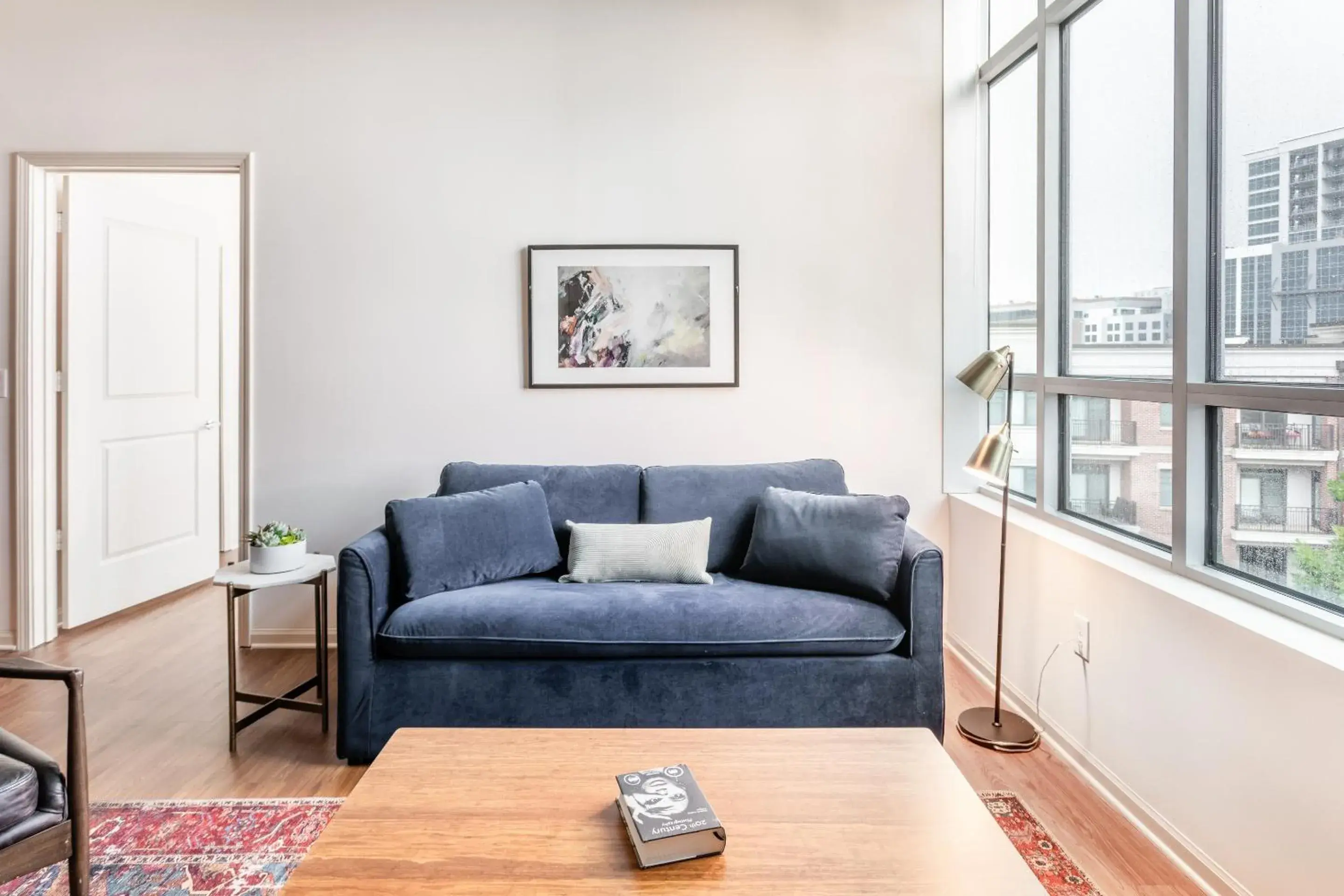 Living room in Mint House Greenville Downtown By Kasa Living room in Mint House Greenville Downtown By Kasa