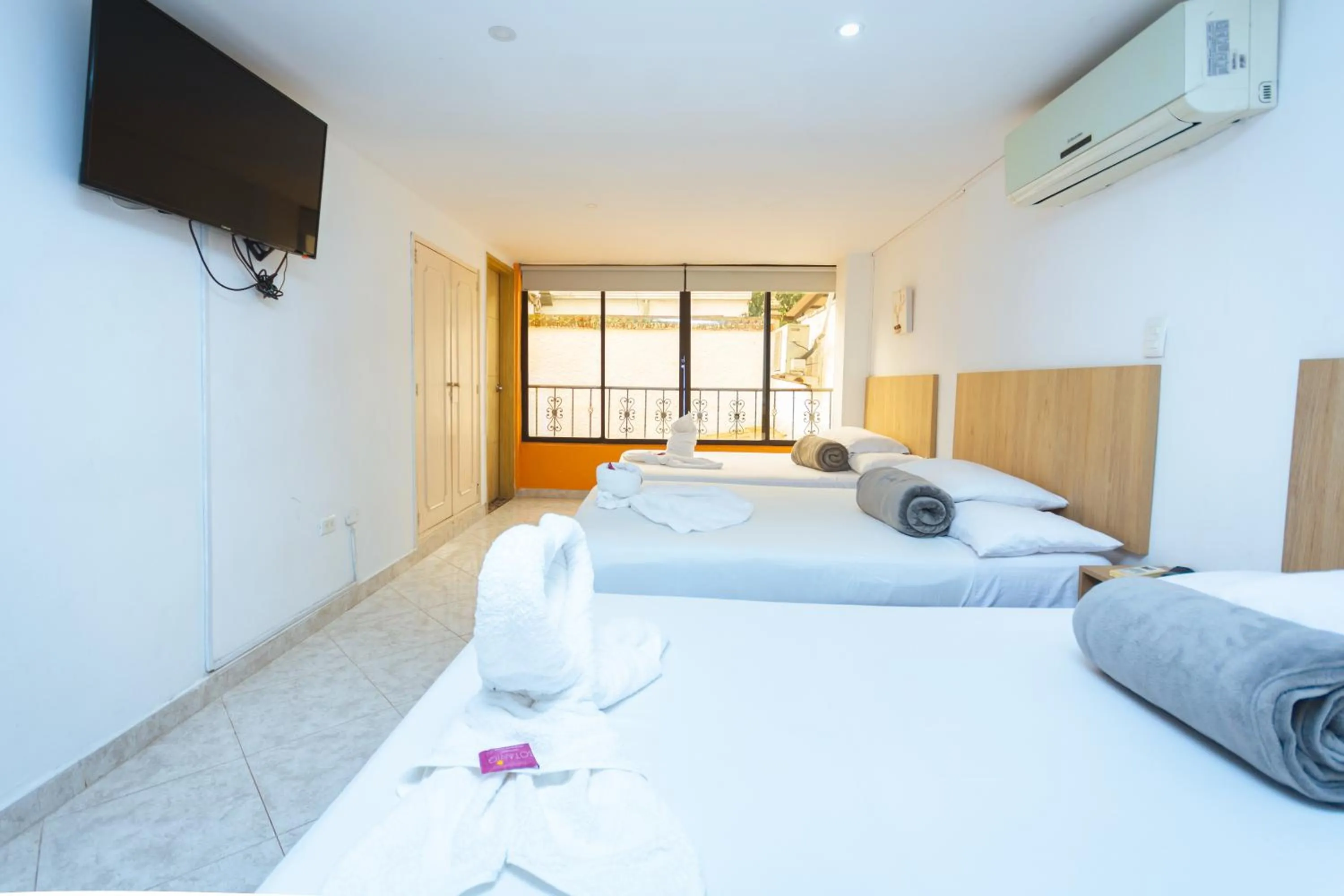 Bed in Hotel Colores Boutique